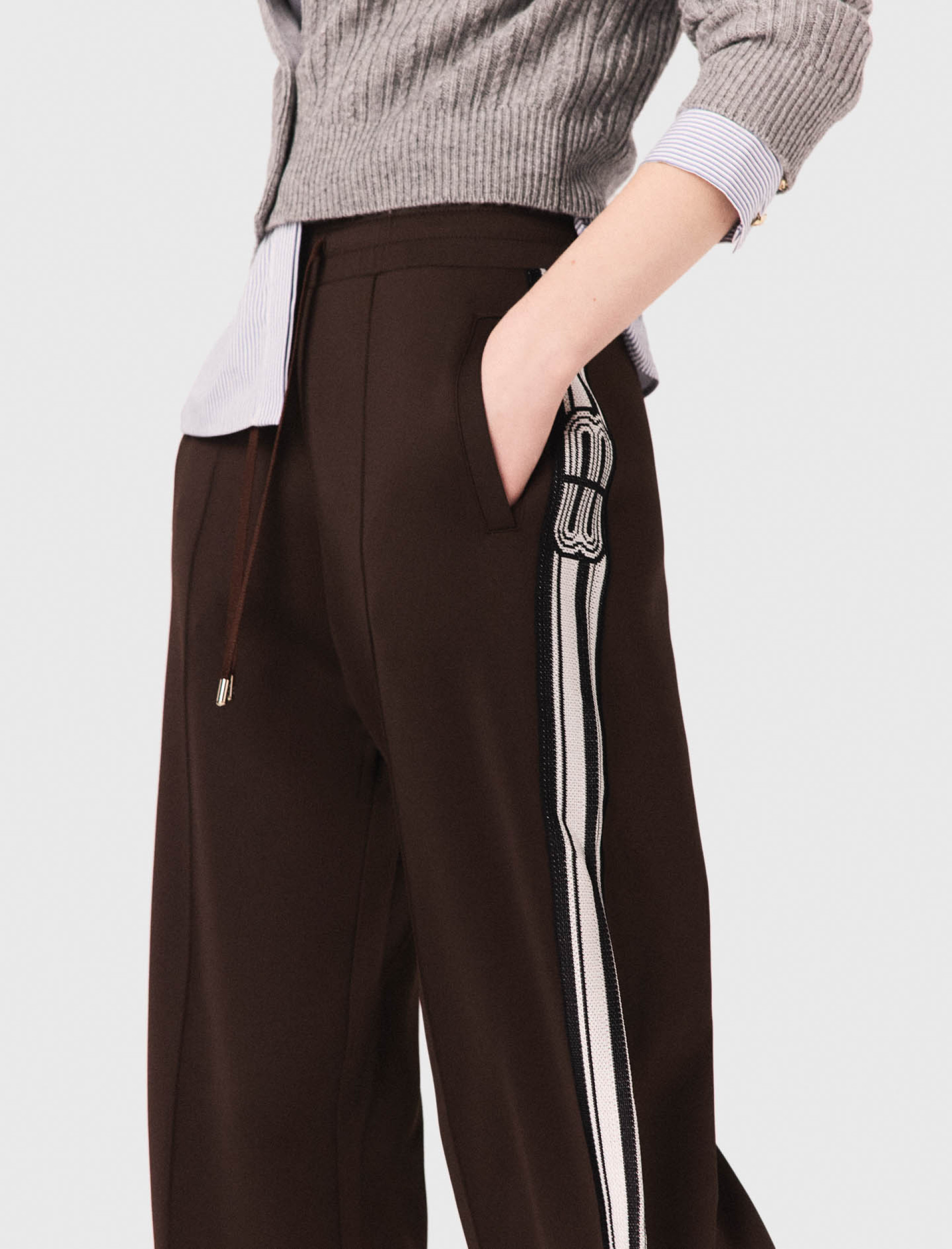 Жіночі коричневі брюки з лампасами Жіночі коричневі брюки з лампасами