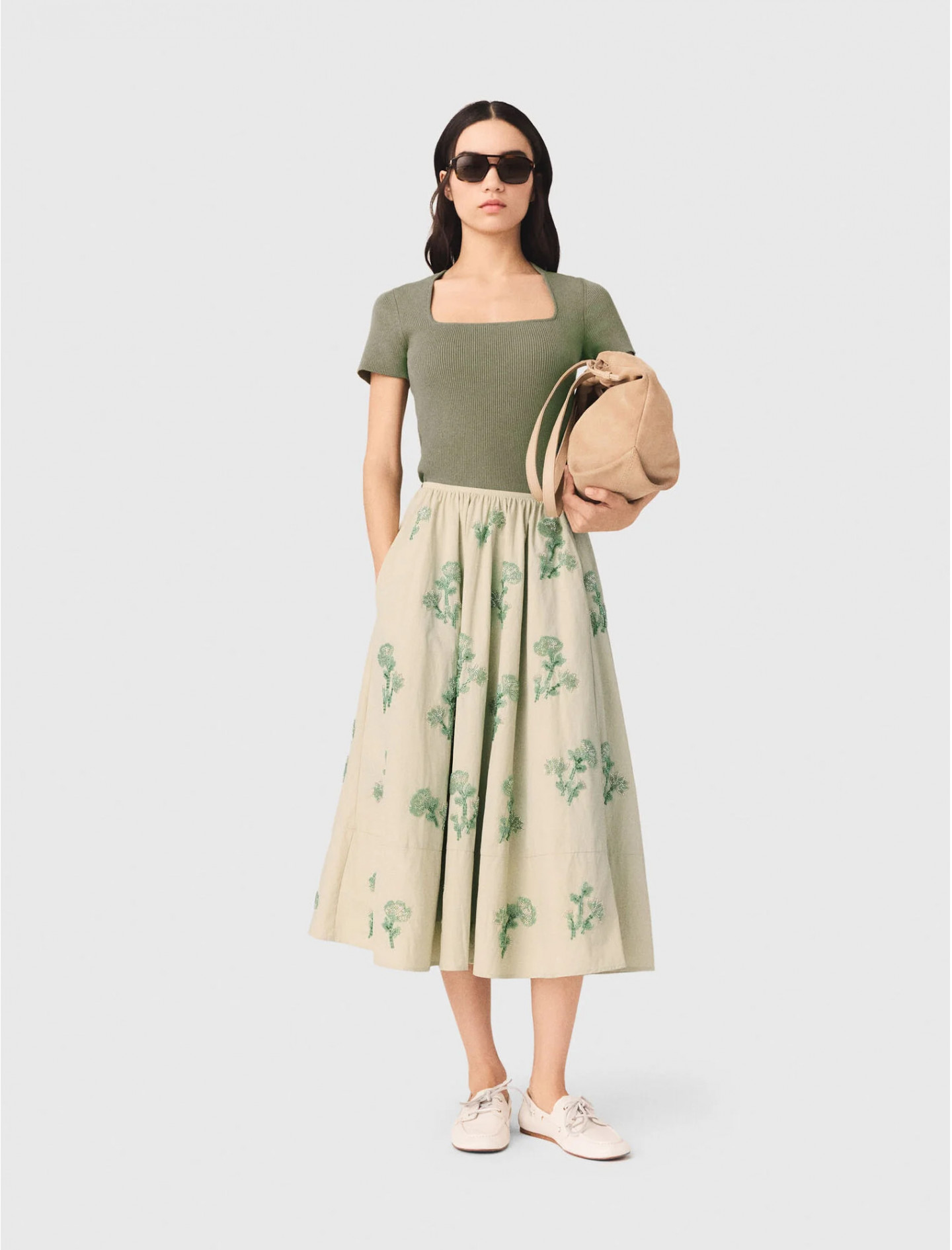 Жіноча спідниця з вишитої технічної тканини