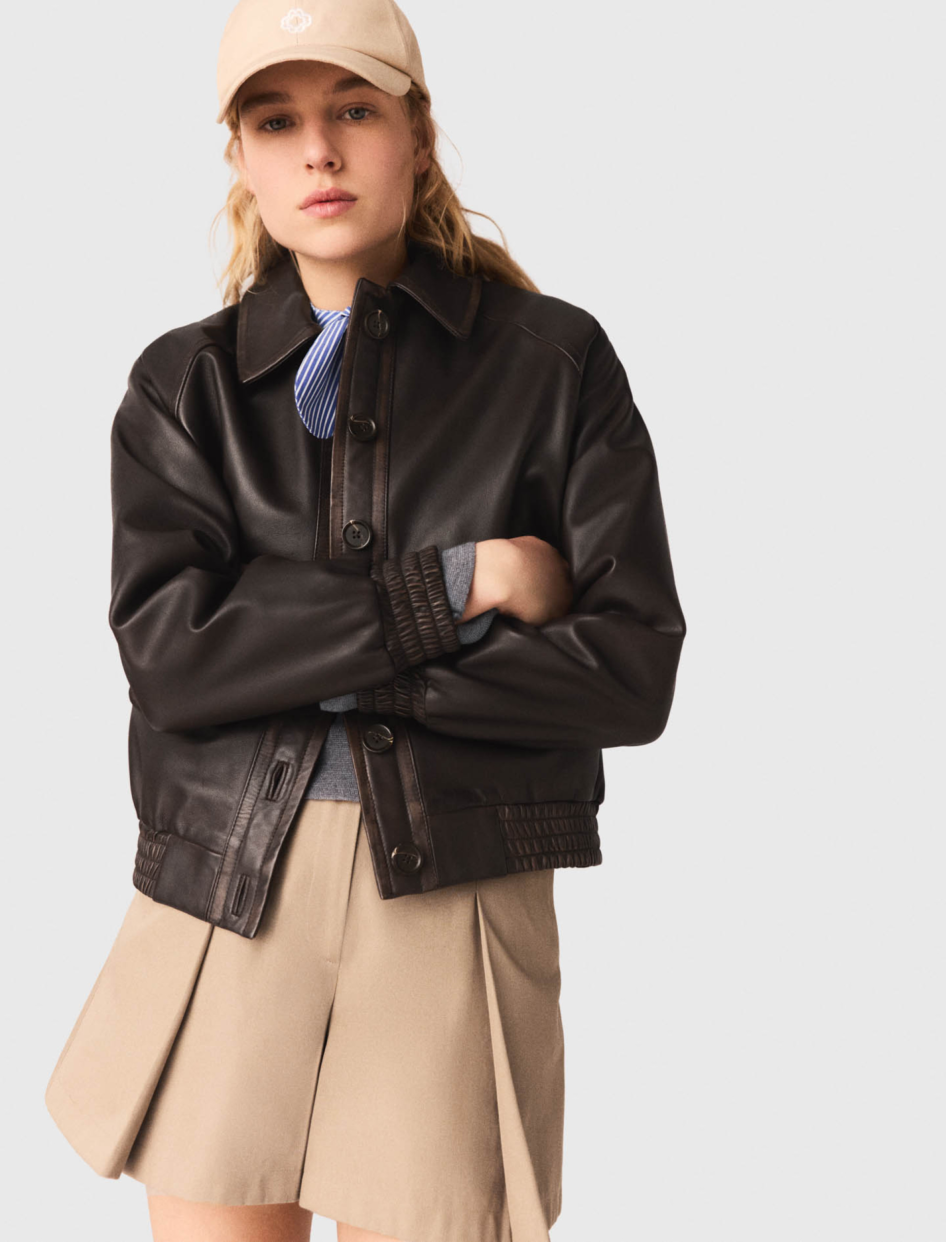 Женская коричневая кожаная куртка