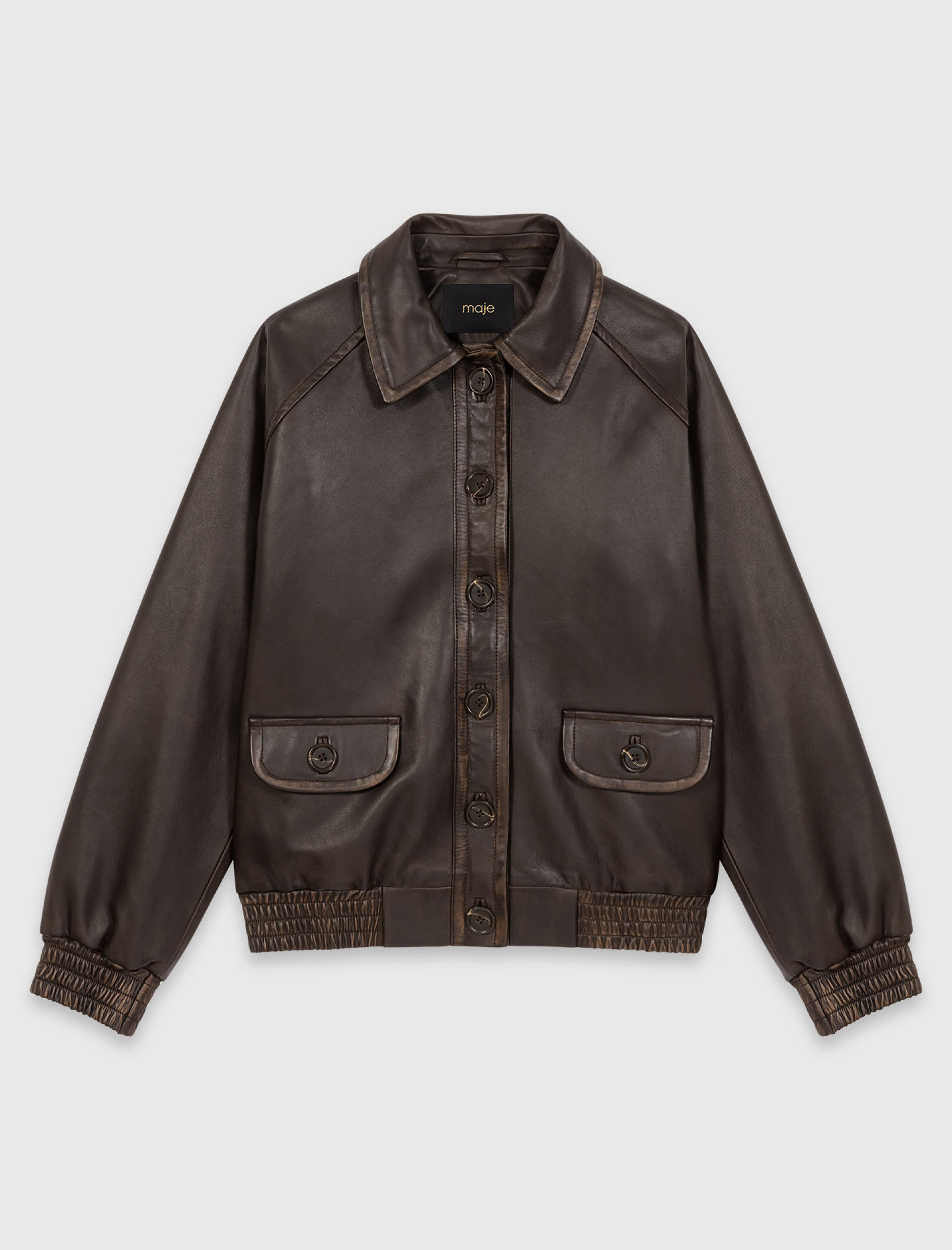 Женская коричневая кожаная куртка