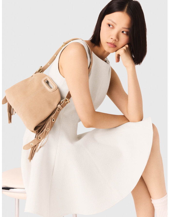 Жіноча молочна твідова сукня