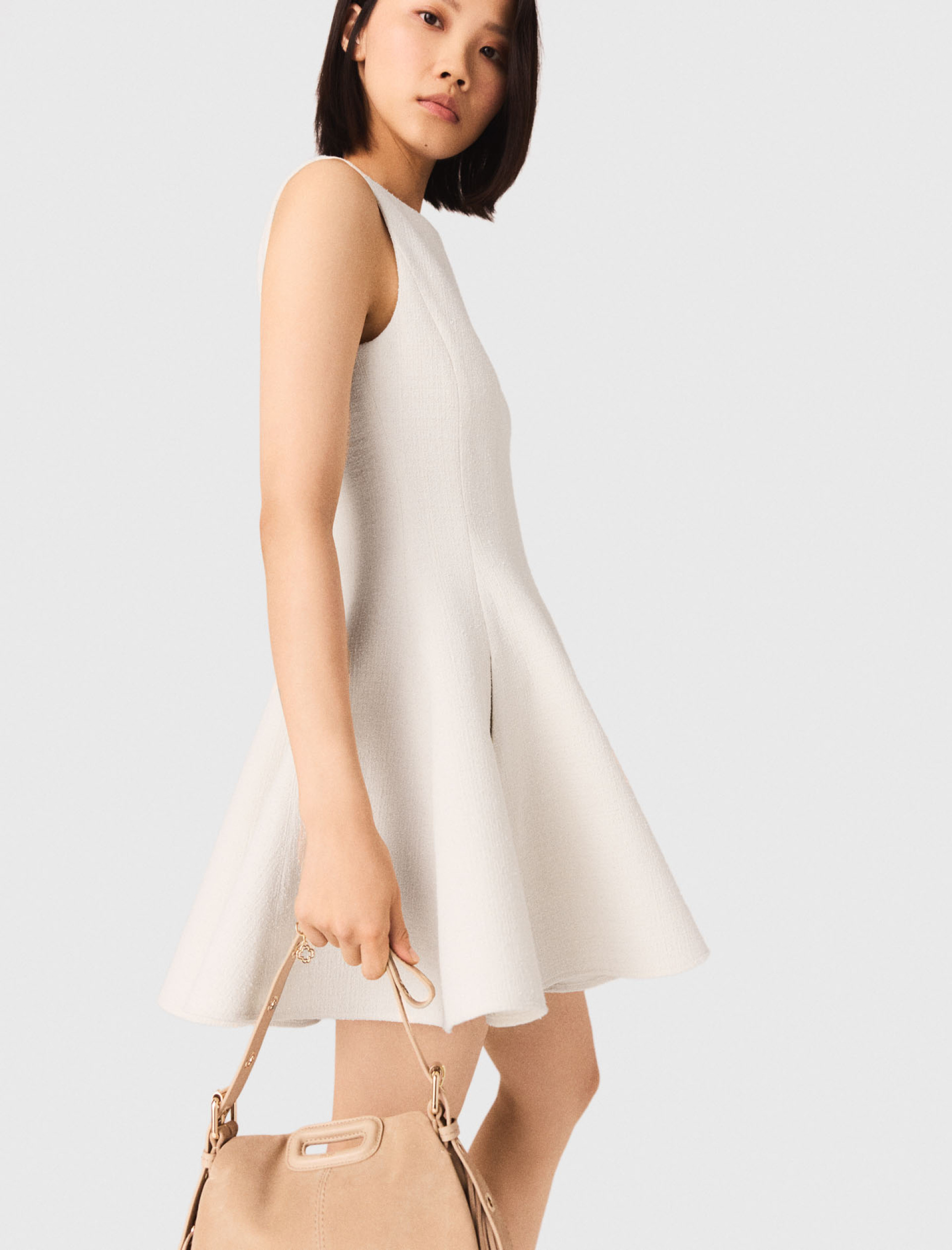 Жіноча молочна твідова сукня Жіноча молочна твідова сукня