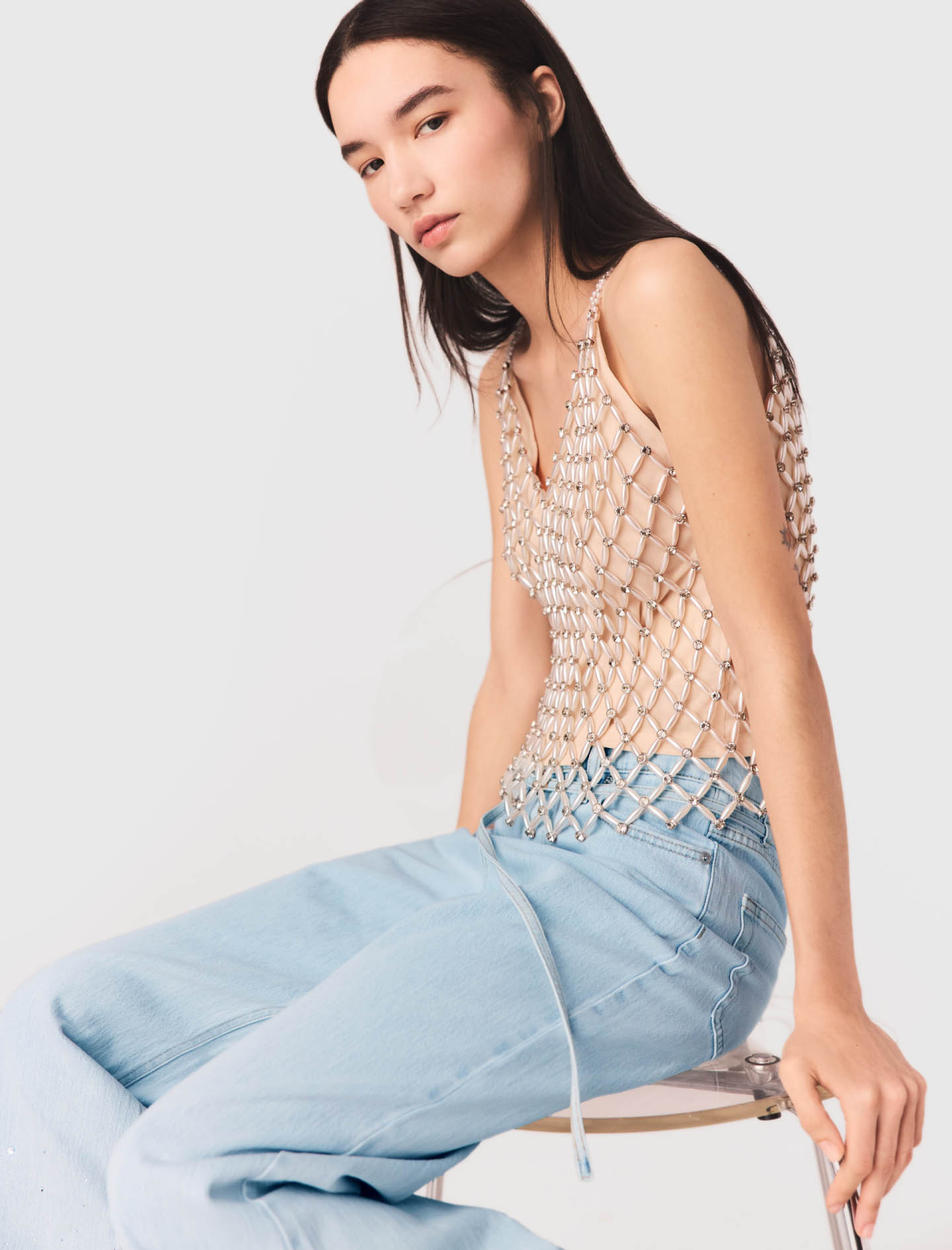 Женский топ, расшитый бисером Женский топ, расшитый бисером