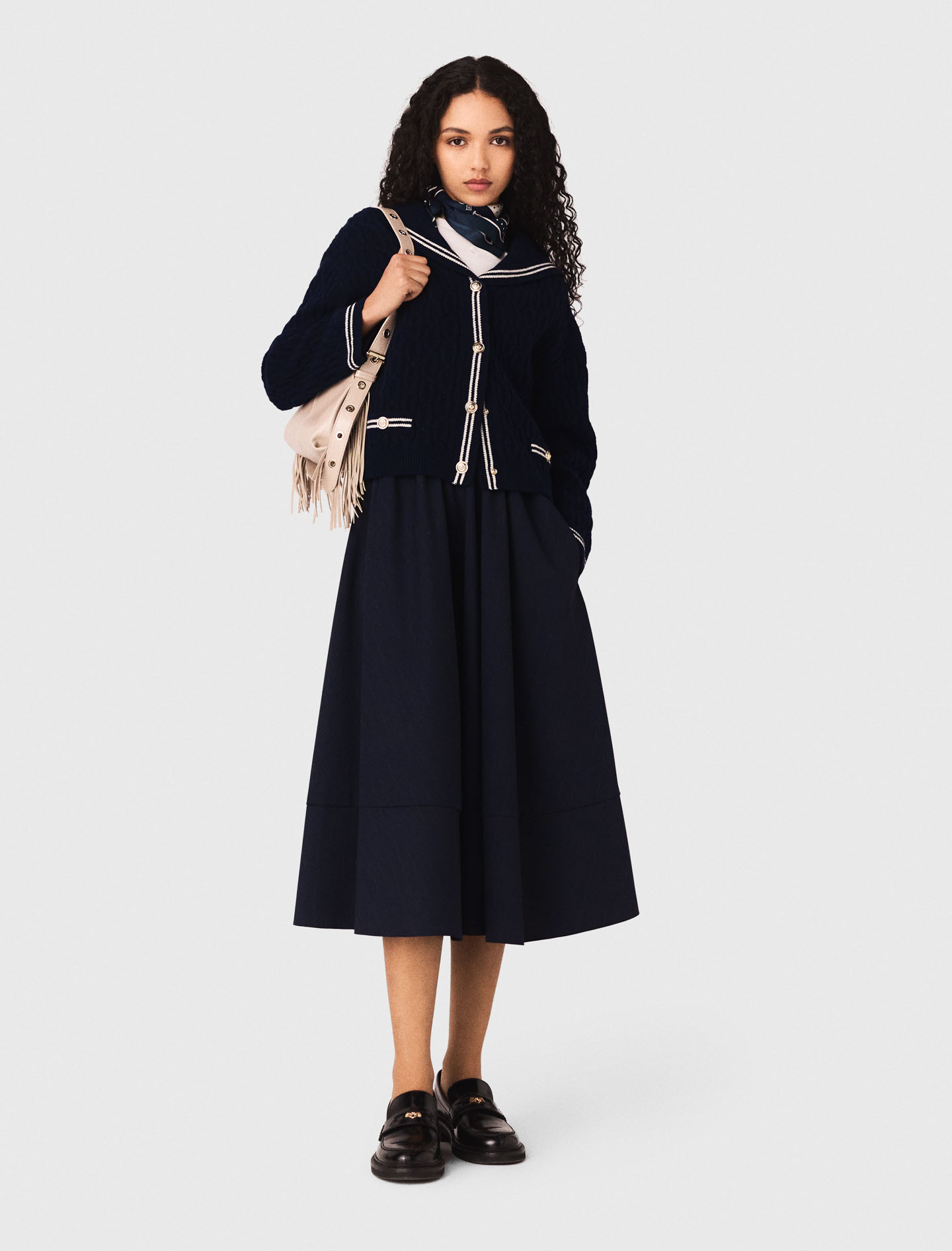 Жіноча синя спідниця у смужку середньої довжини