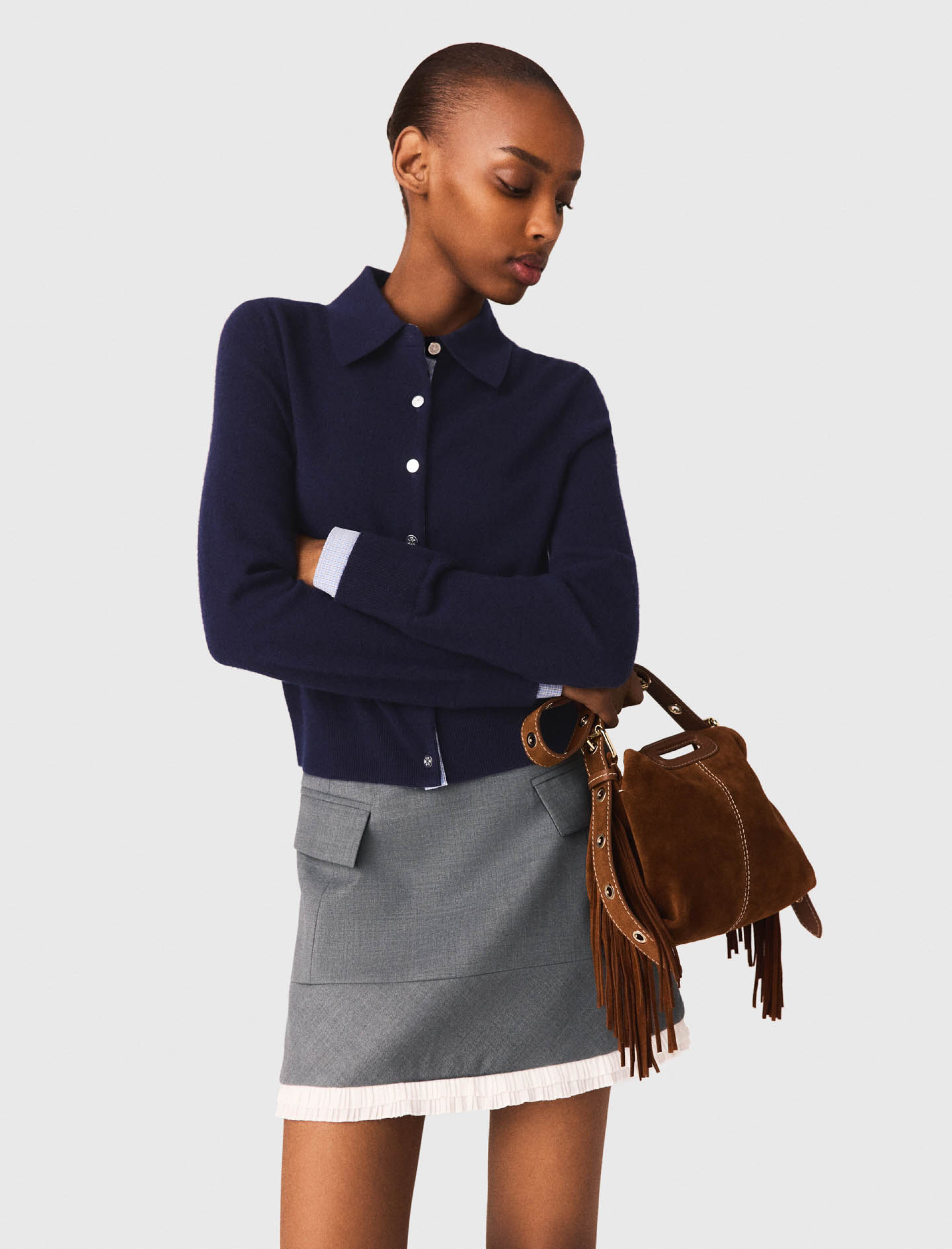 Жіноча міні спідниця А-силуету з кишенями Жіноча міні спідниця А-силуету з кишенями