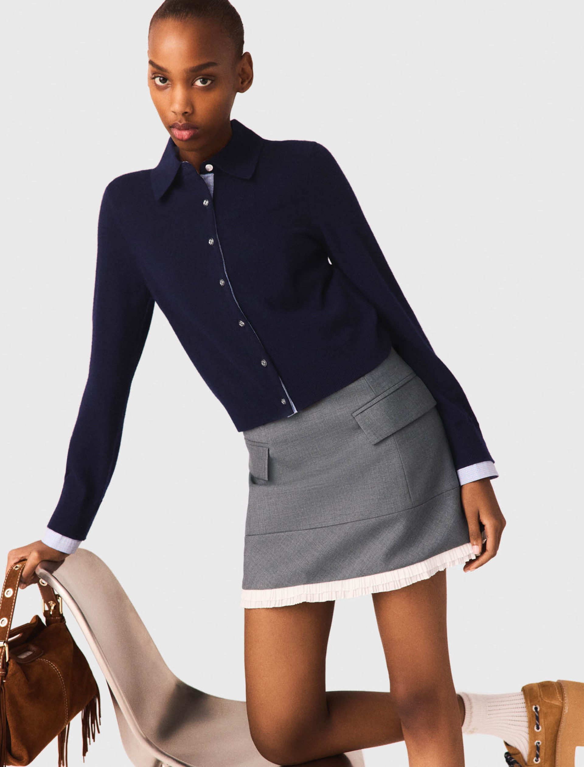 Жіноча міні спідниця А-силуету з кишенями Жіноча міні спідниця А-силуету з кишенями