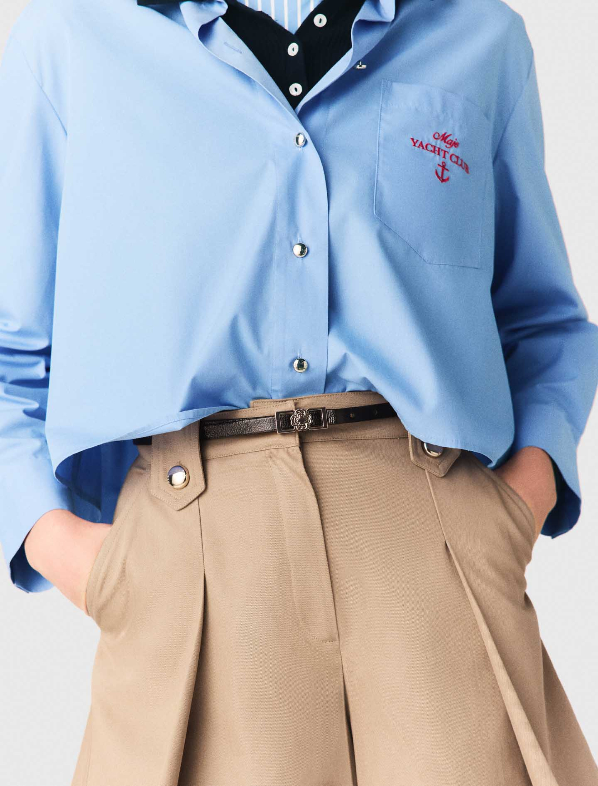 Жіночі бежеві шорти зі складками