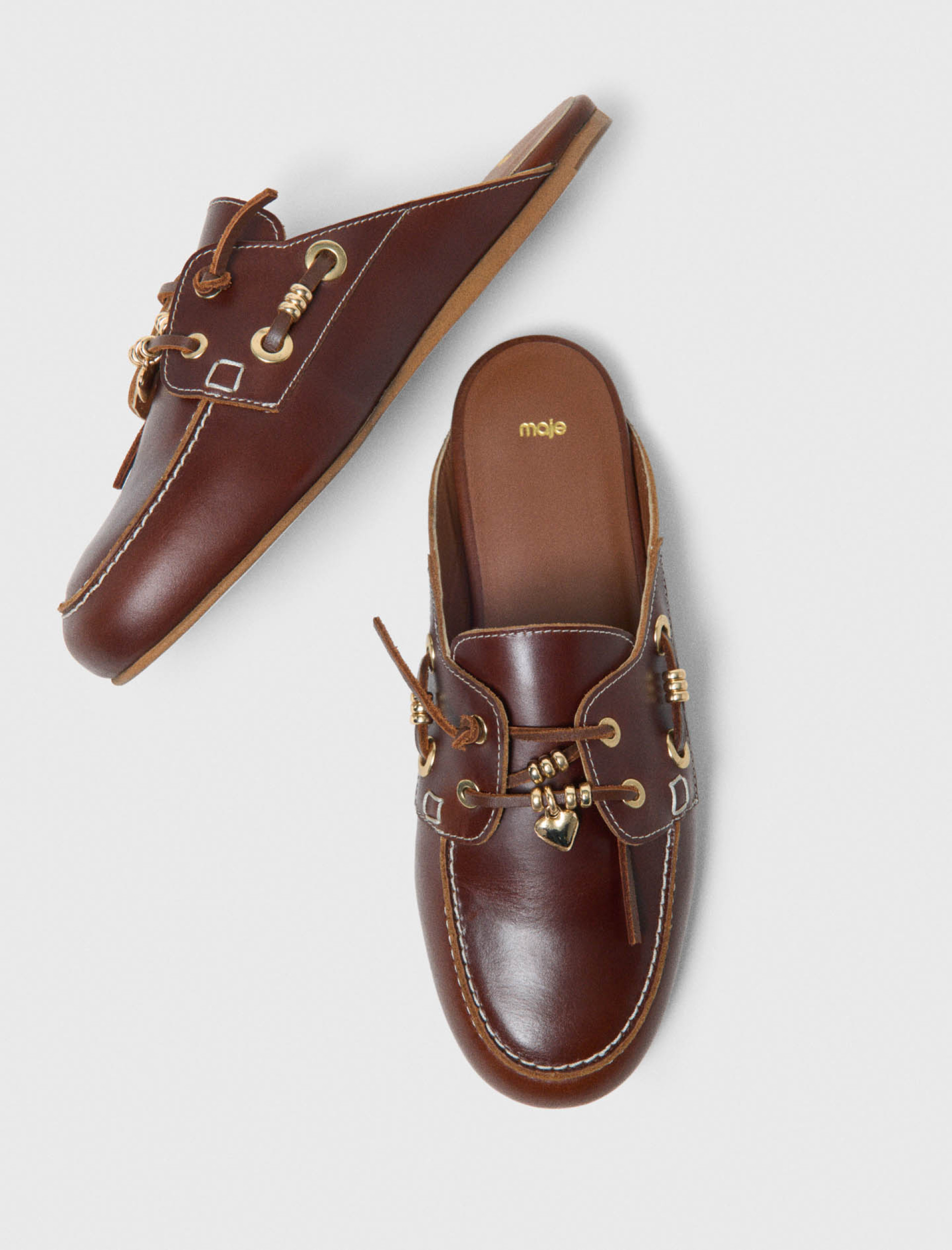 Жіночі коричневі мюлі Жіночі коричневі мюлі