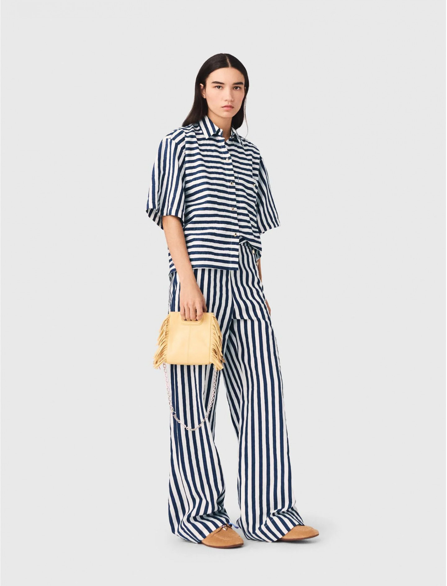 Жіноча смугаста сорочка з нагрудною кишенею