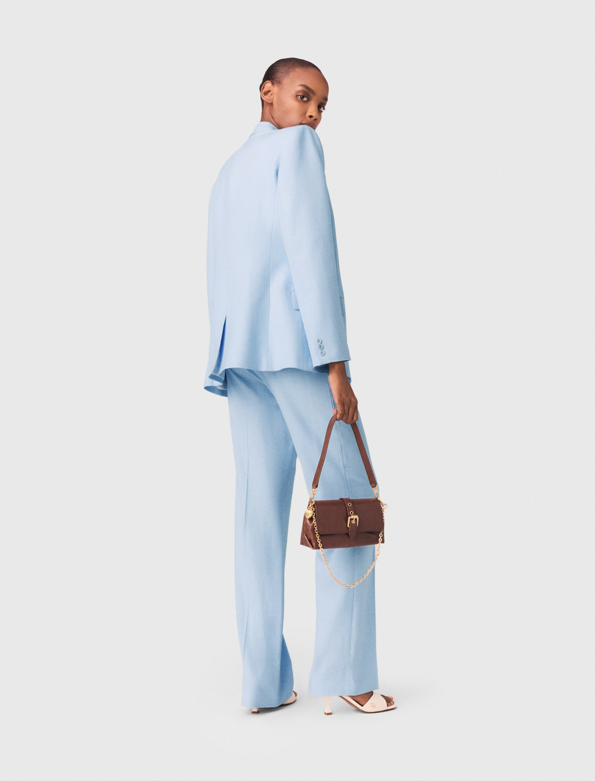 Жіночий блакитний костюмний жакет