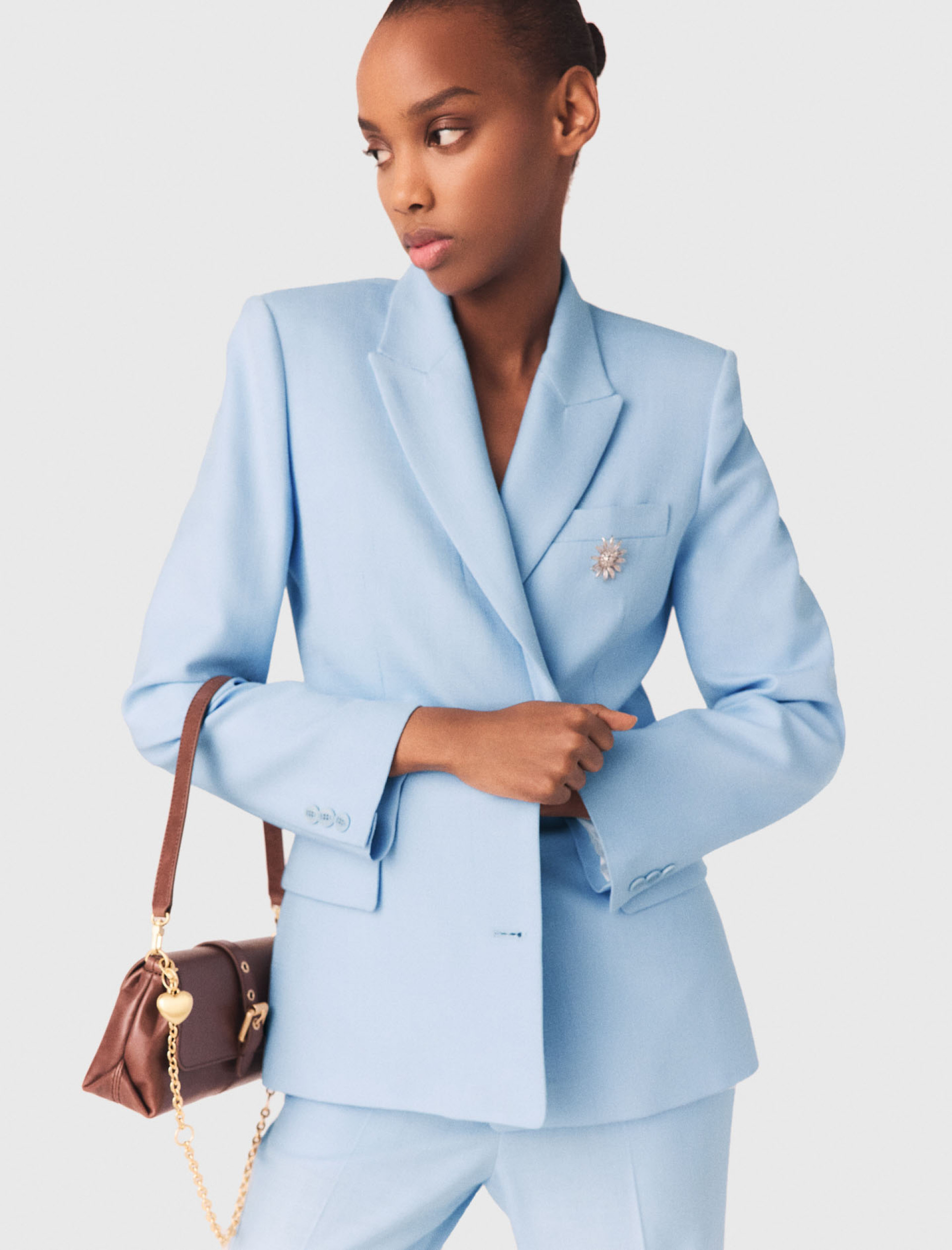 Жіночий блакитний костюмний жакет