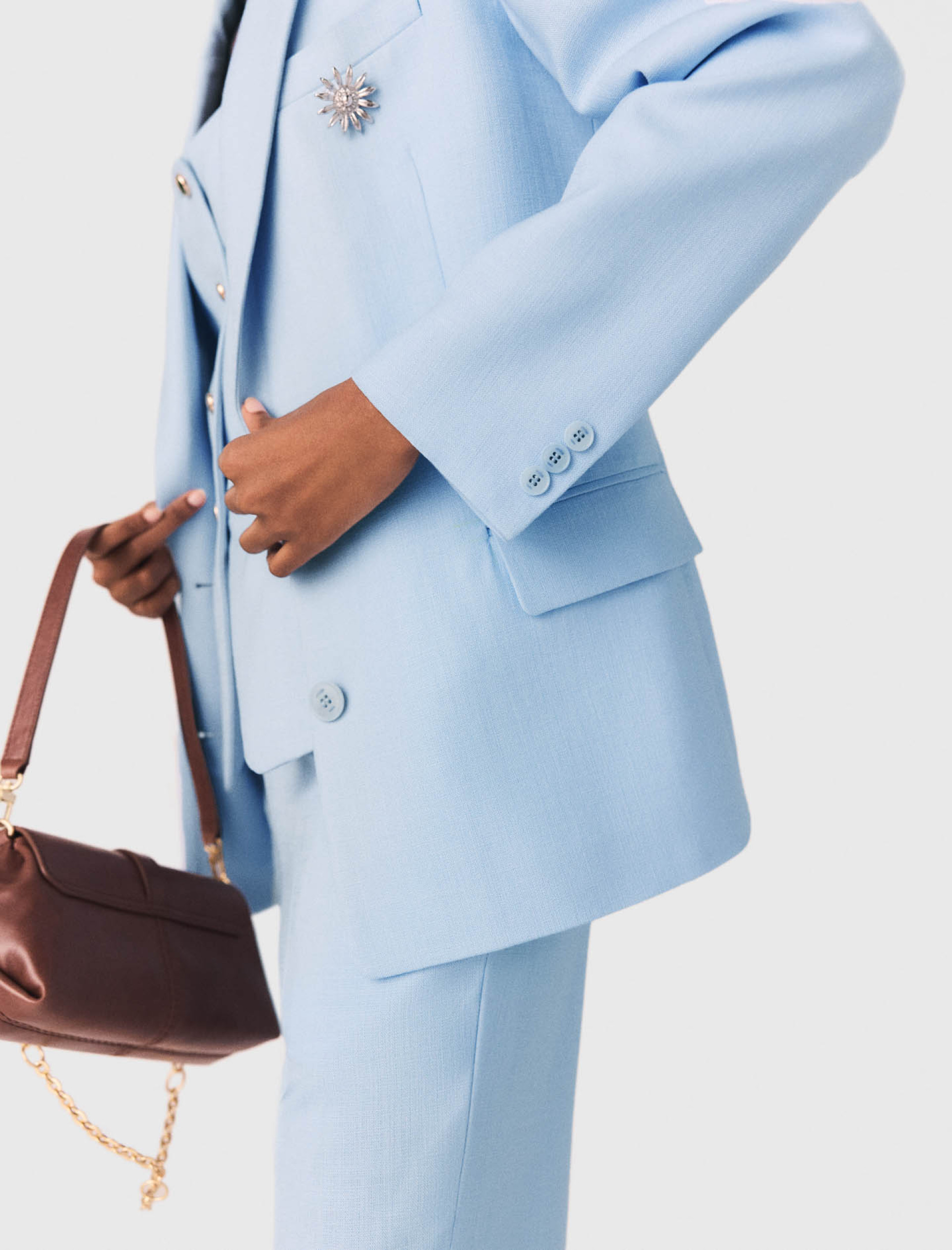 Жіночий блакитний костюмний жакет