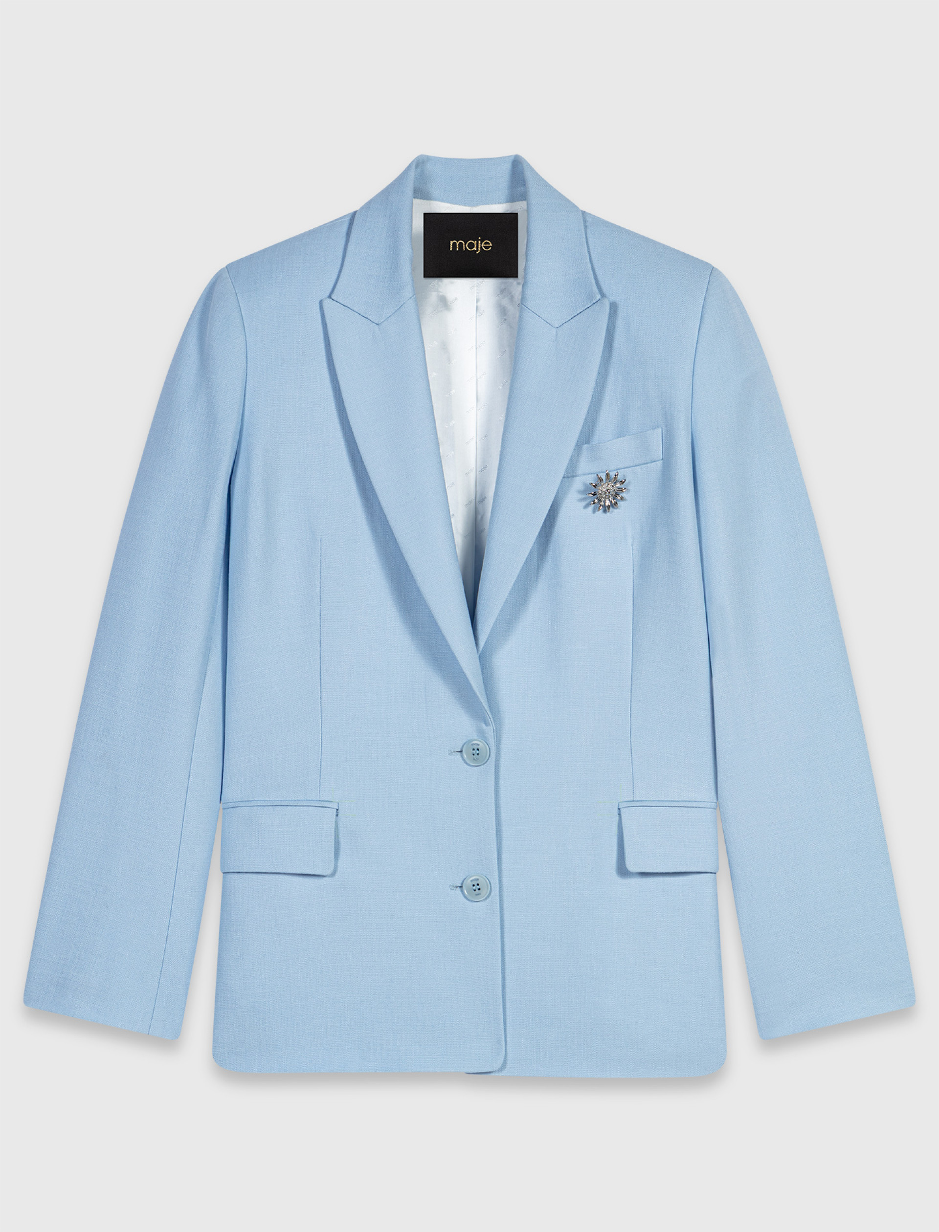 Жіночий блакитний костюмний жакет