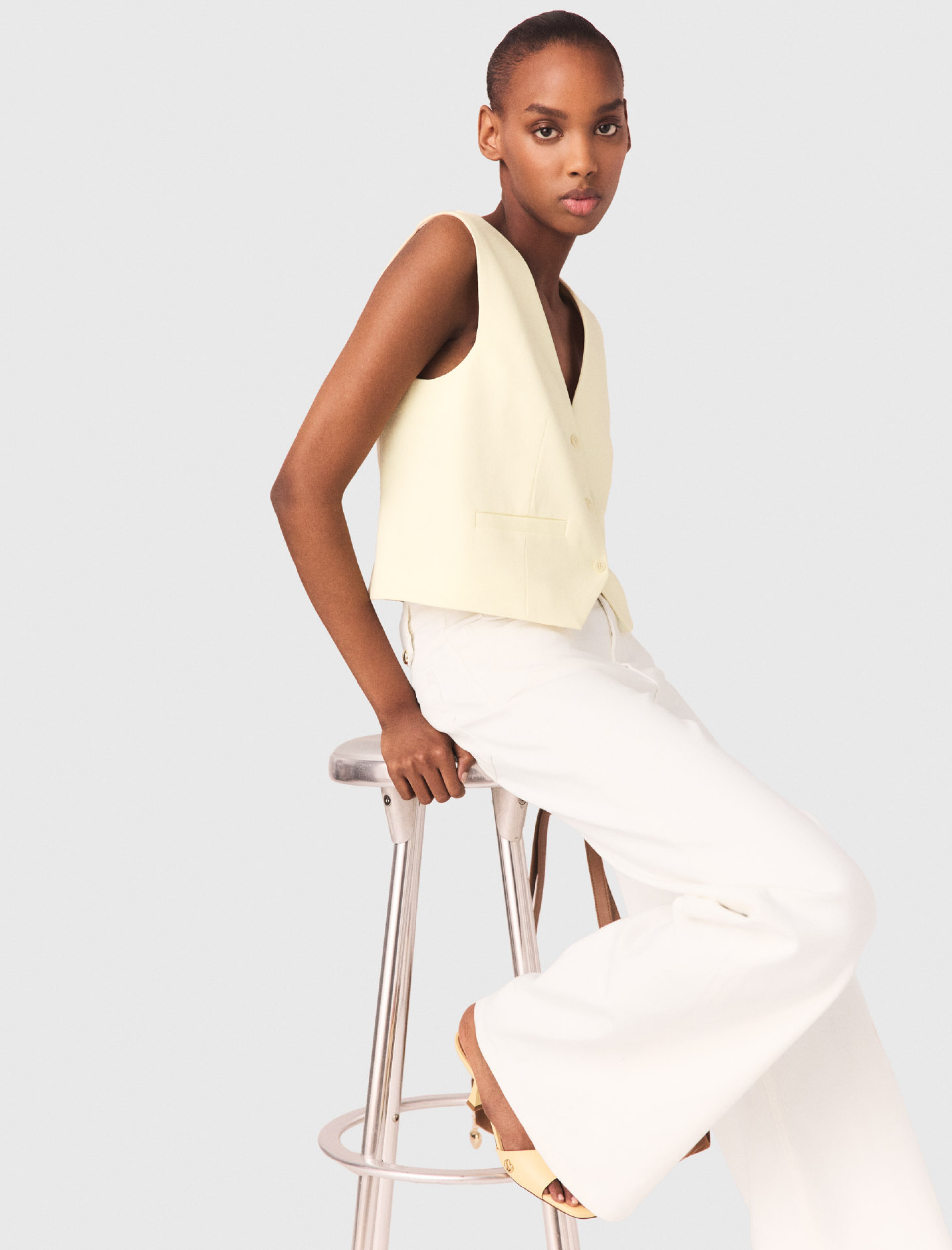 Жіночий жовтий жилет