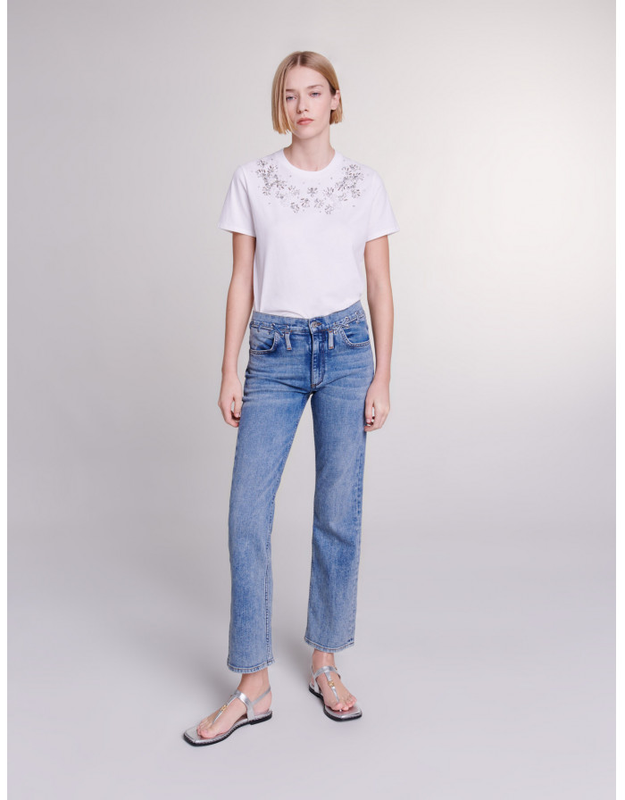 Джинси з плетеними деталями