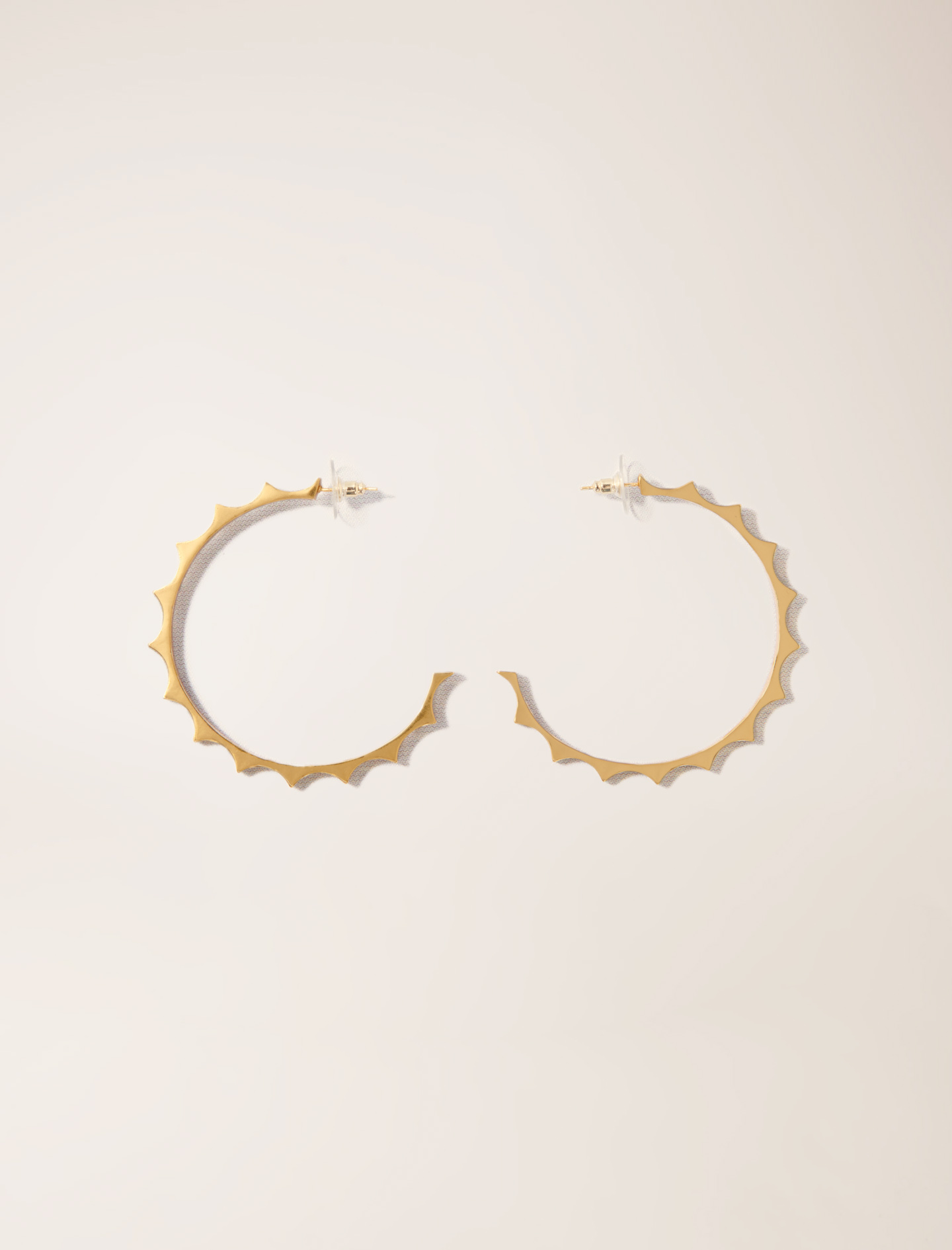 Жіночі золотисті сережки-кільця