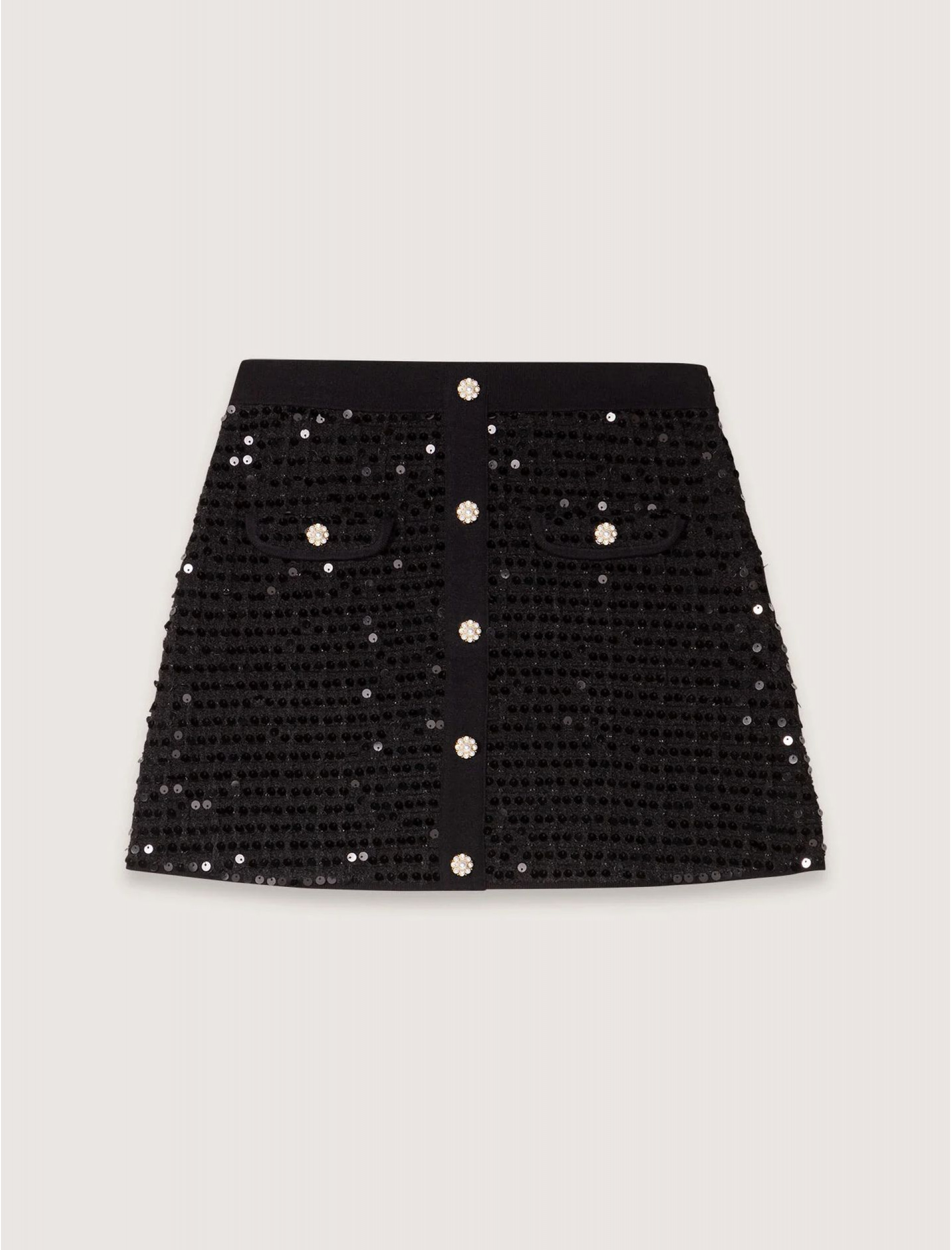 Женская короткая трикотажная юбка с пайетками