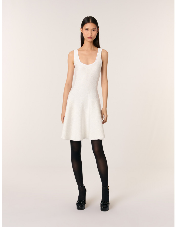 Жіноча трикотажна сукня з паєтками