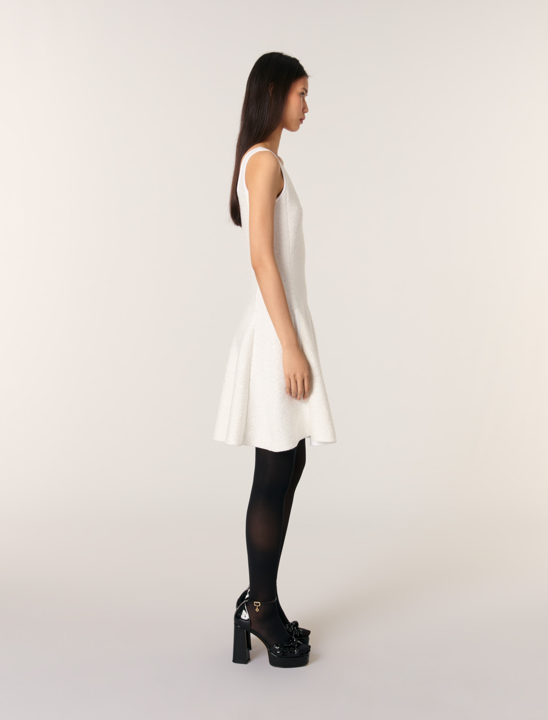 Жіноча трикотажна сукня з паєтками