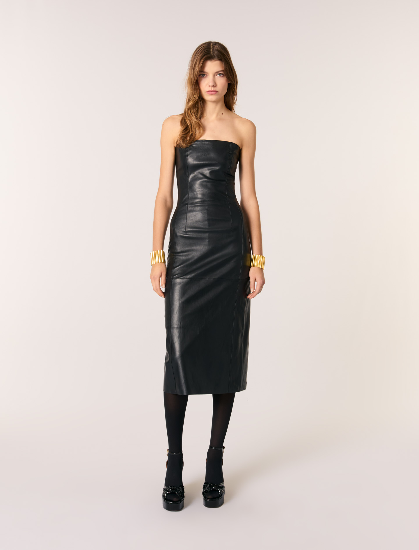 Жіноча сукня міді з еластичної шкіри