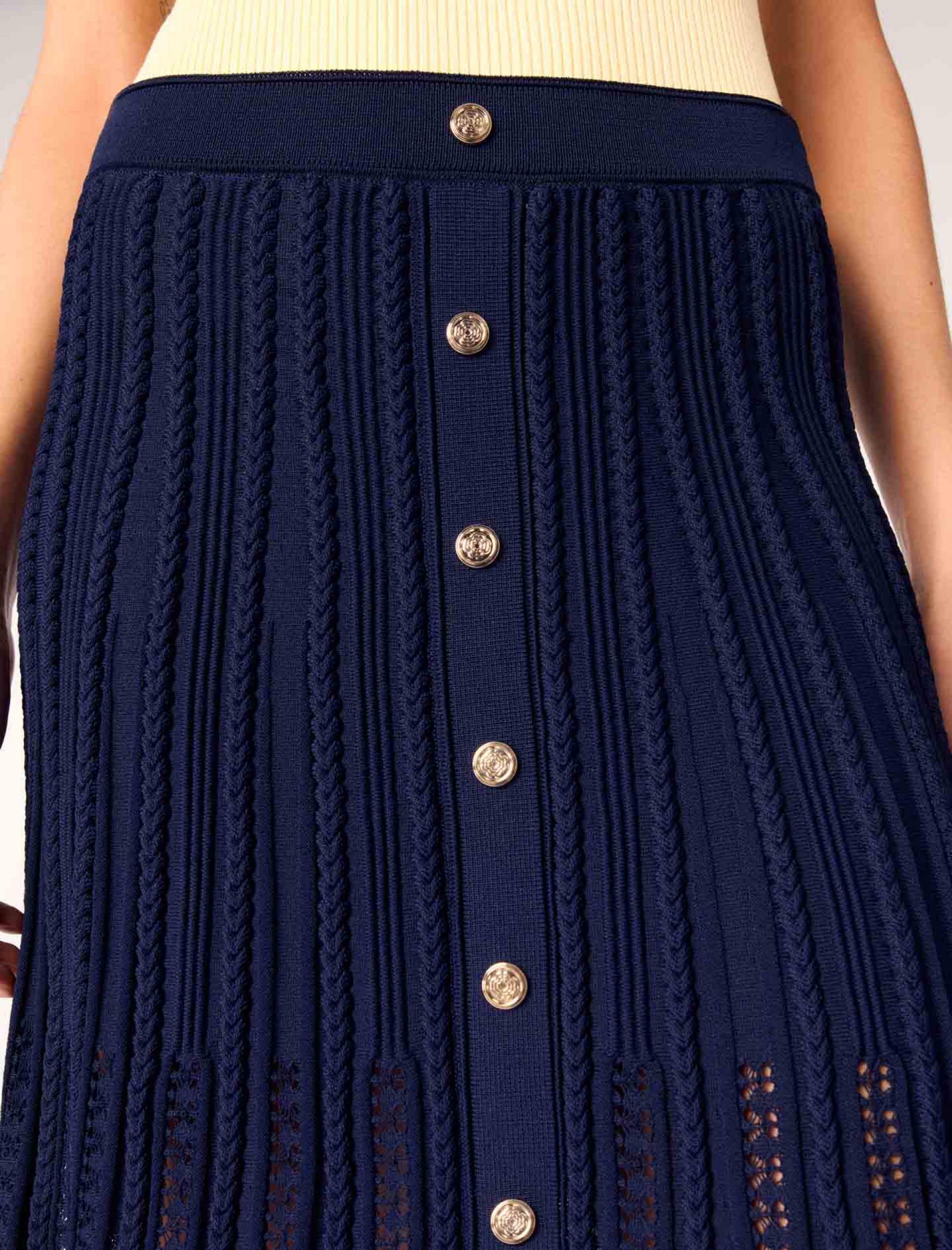 Женская короткая плетеная юбка из трикотажа