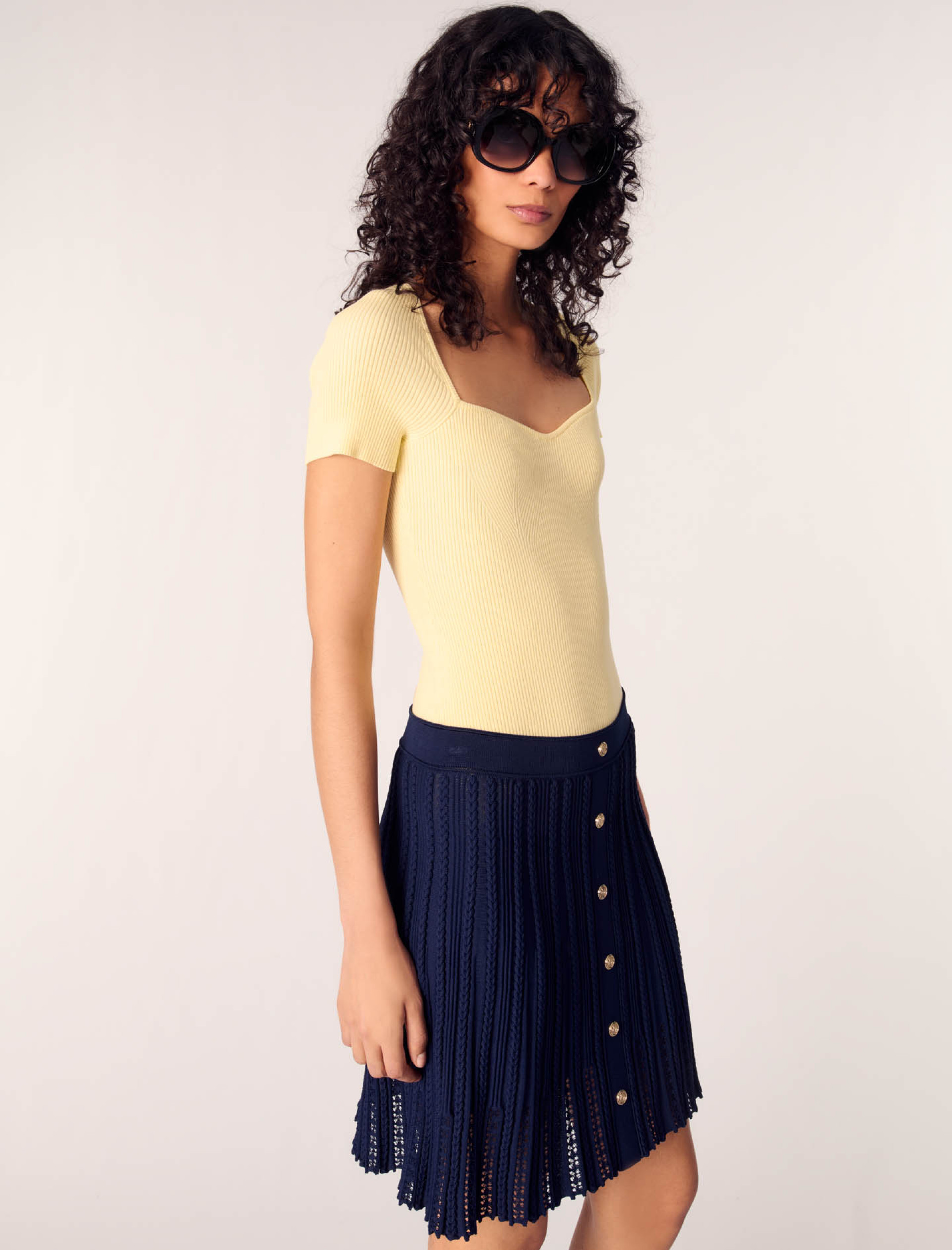 Женская короткая плетеная юбка из трикотажа