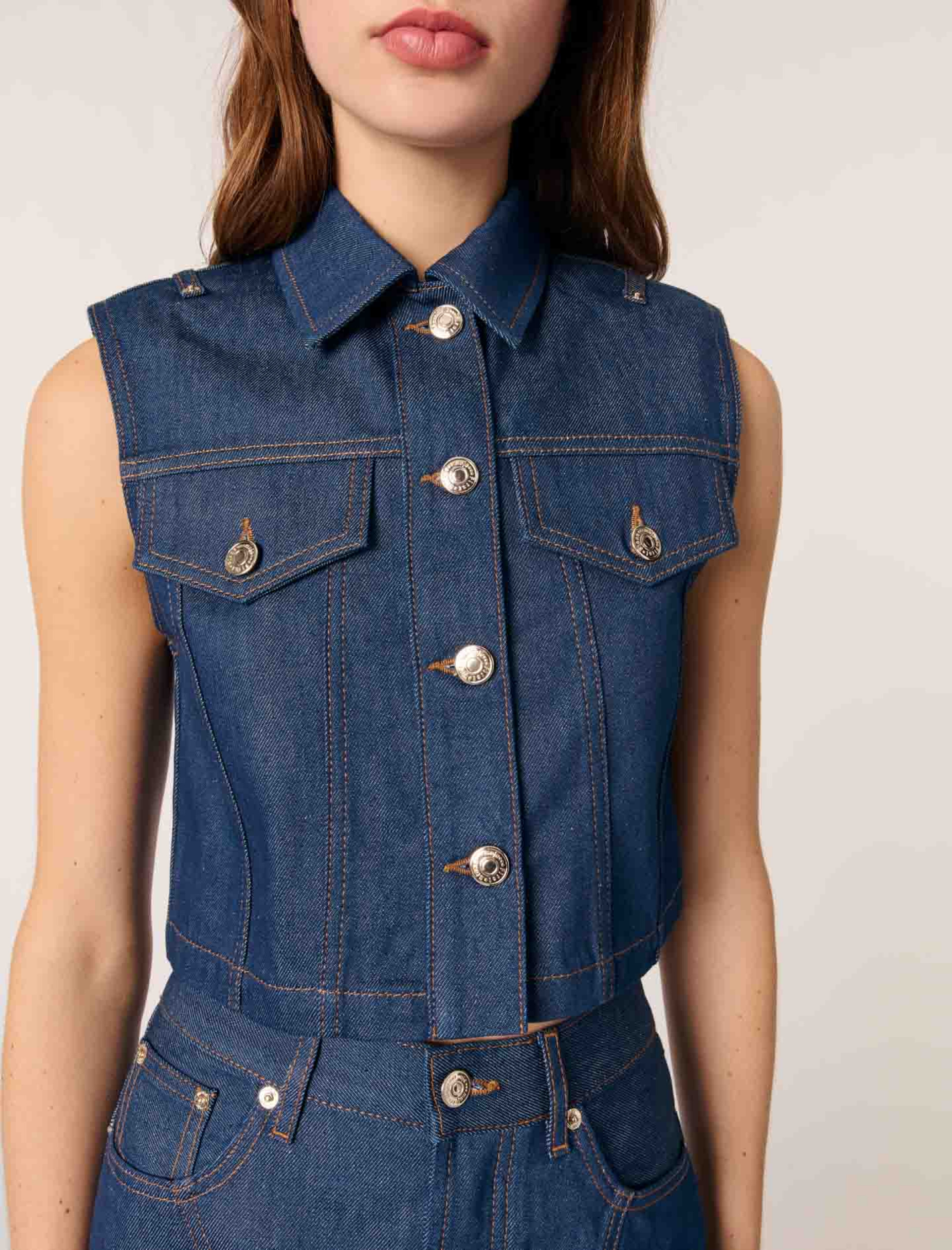 Жіноча коротка джинсова куртка Жіноча коротка джинсова куртка