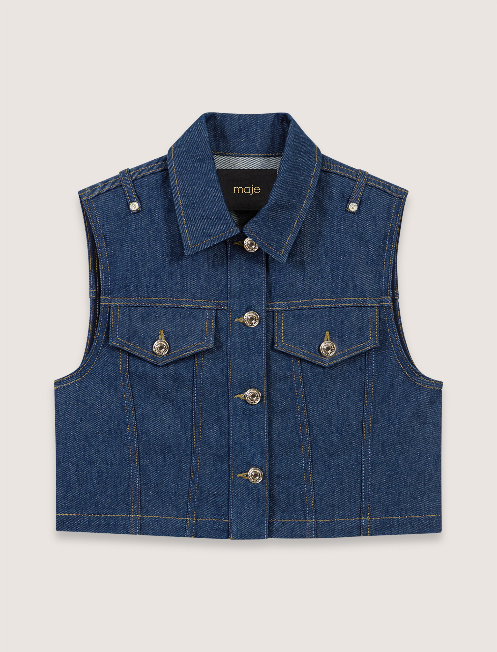 Жіноча коротка джинсова куртка Жіноча коротка джинсова куртка