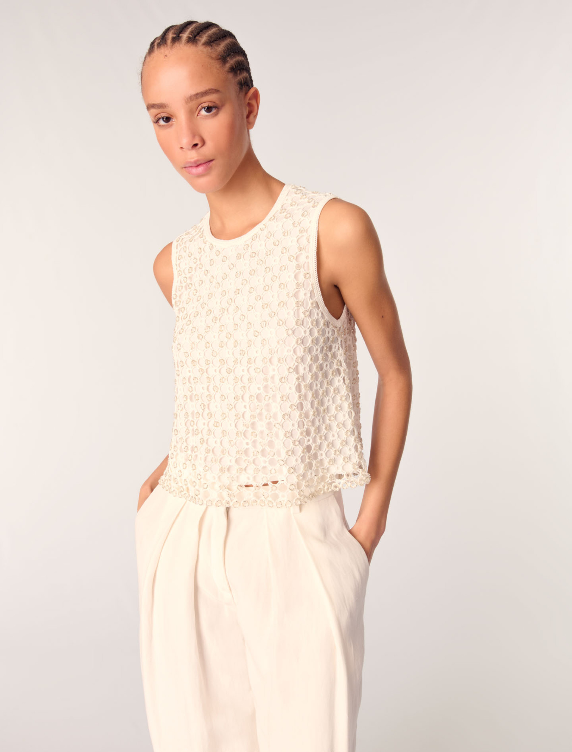 Жіночий в'язаний топ з бісером