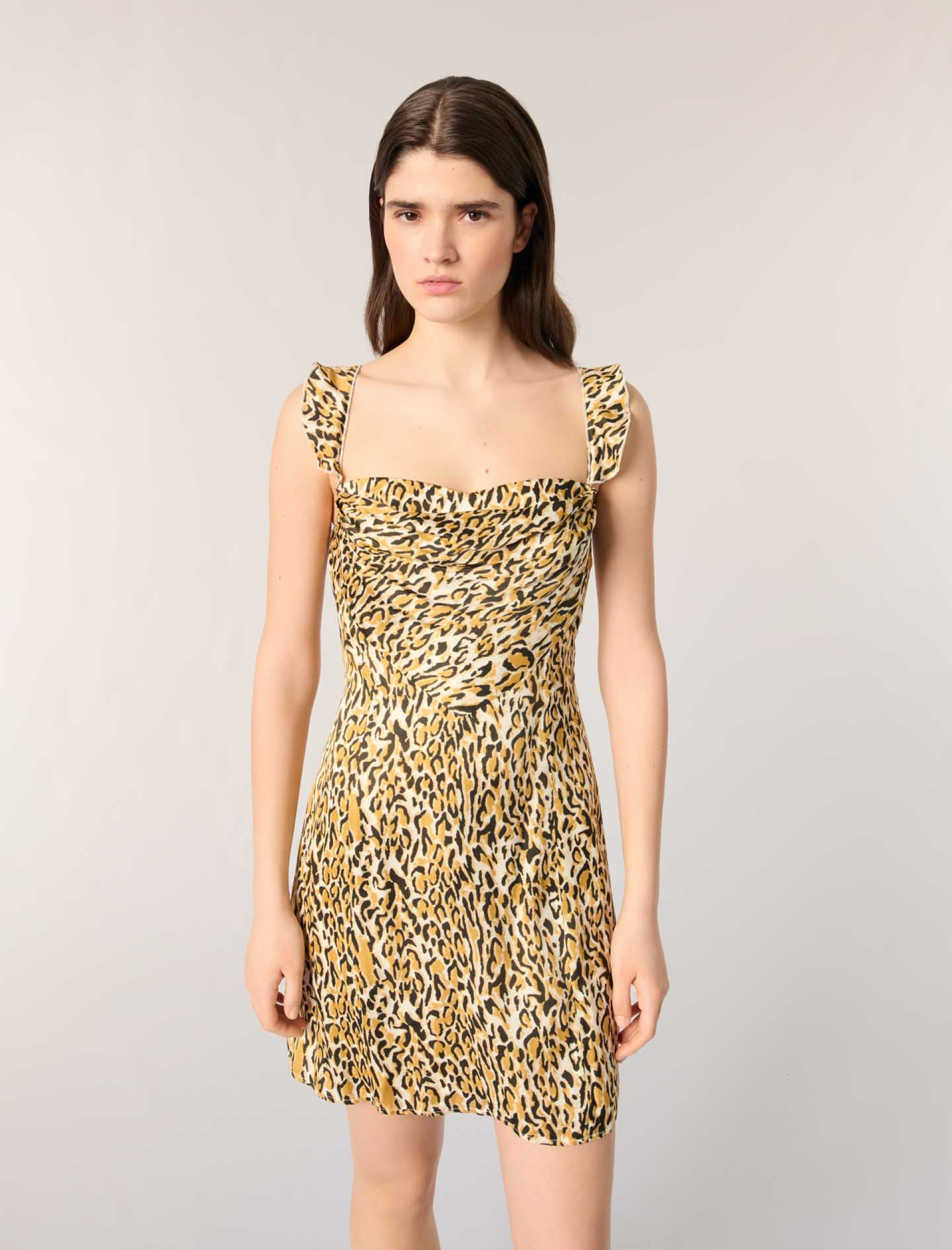 Жіноча сукня з леопардовим принтом Жіноча сукня з леопардовим принтом