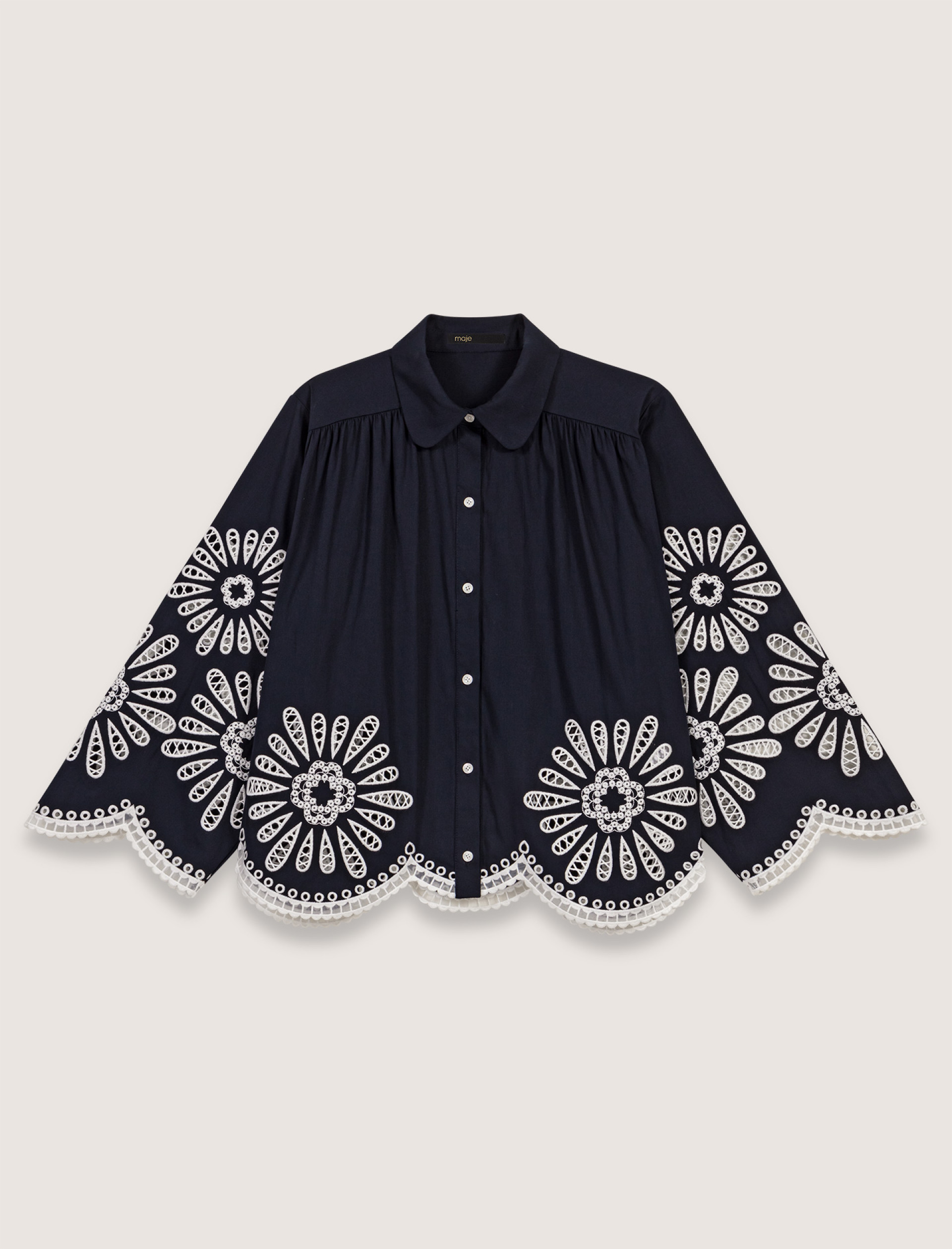 Жіноча сорочка з деталями, зв'язаними гачком