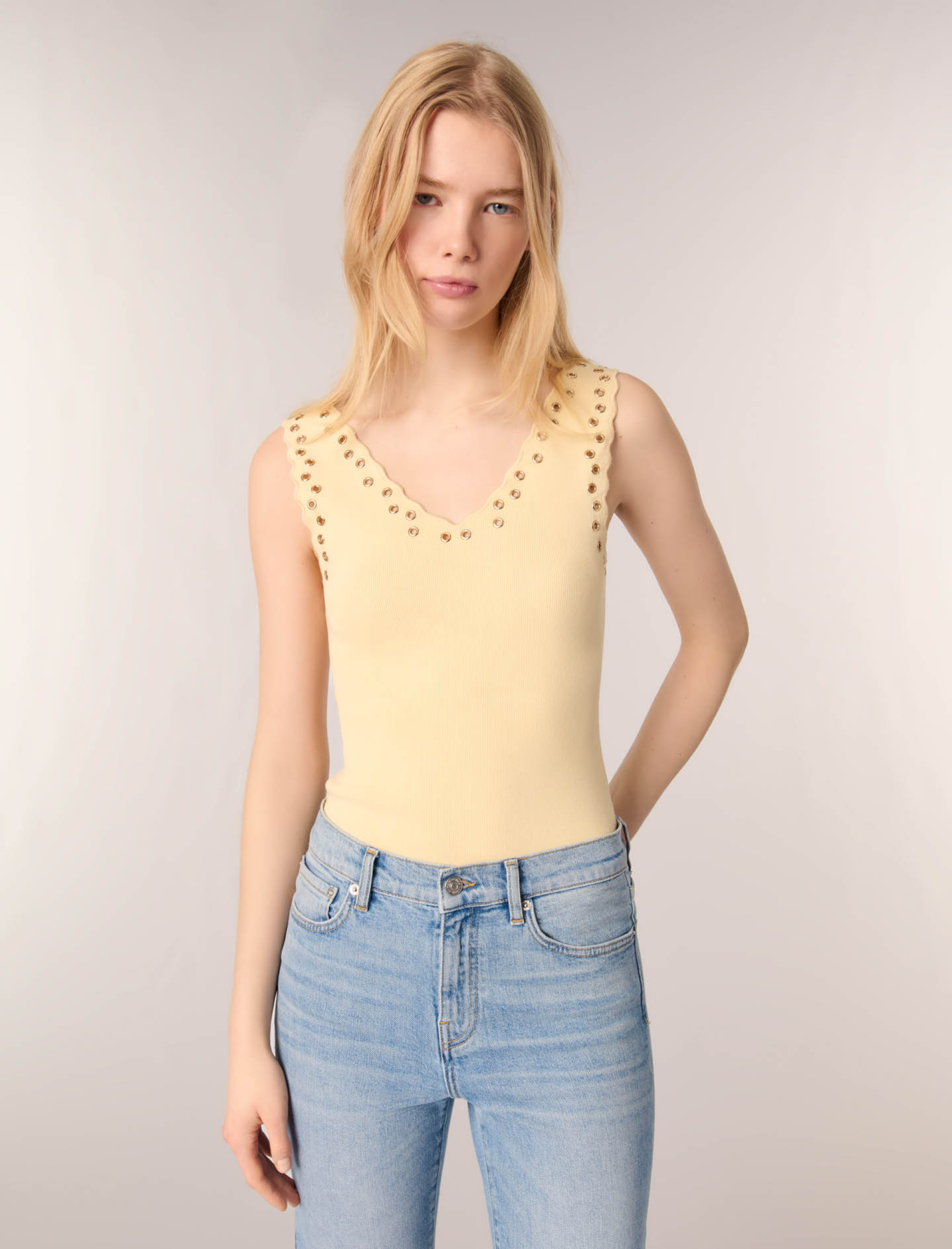 Женский топ с люверсами Женский топ с люверсами