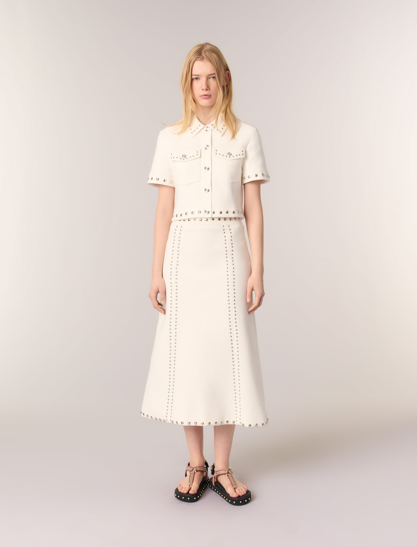 Женская юбка миди с заклепкамиЖенская юбка миди с заклепкамиЖенская юбка миди с заклепками