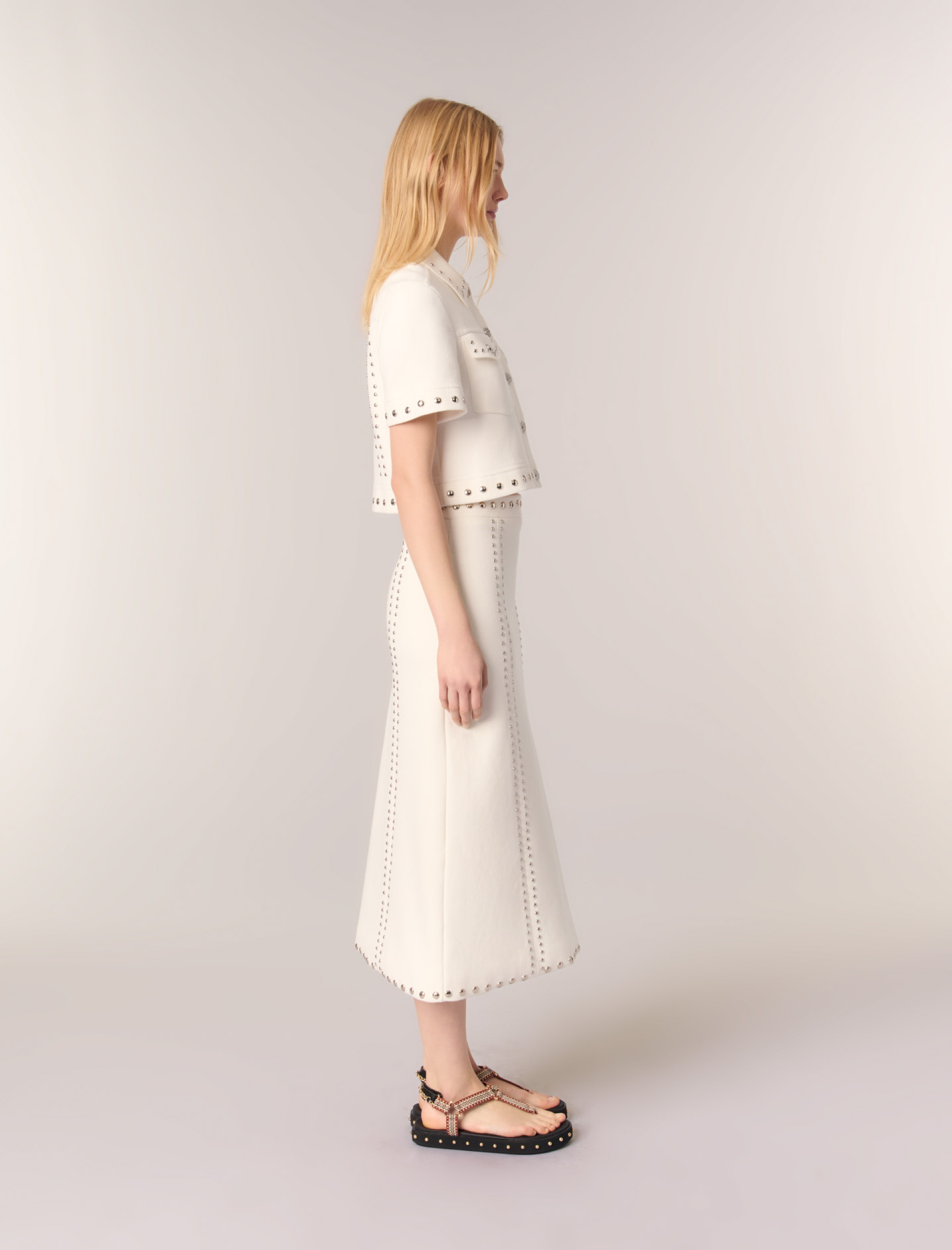 Женская юбка миди с заклепкамиЖенская юбка миди с заклепкамиЖенская юбка миди с заклепками