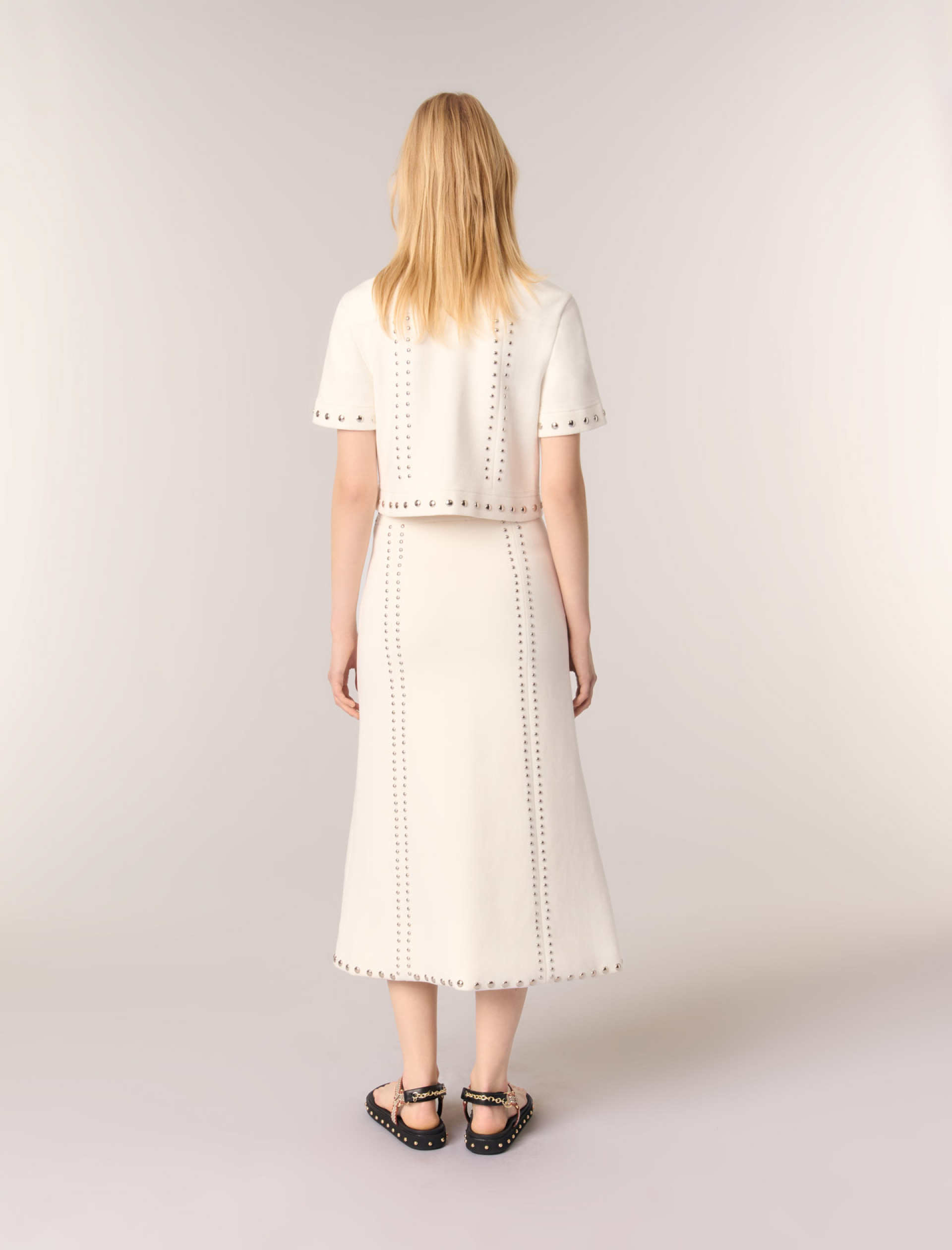 Женская юбка миди с заклепкамиЖенская юбка миди с заклепкамиЖенская юбка миди с заклепками