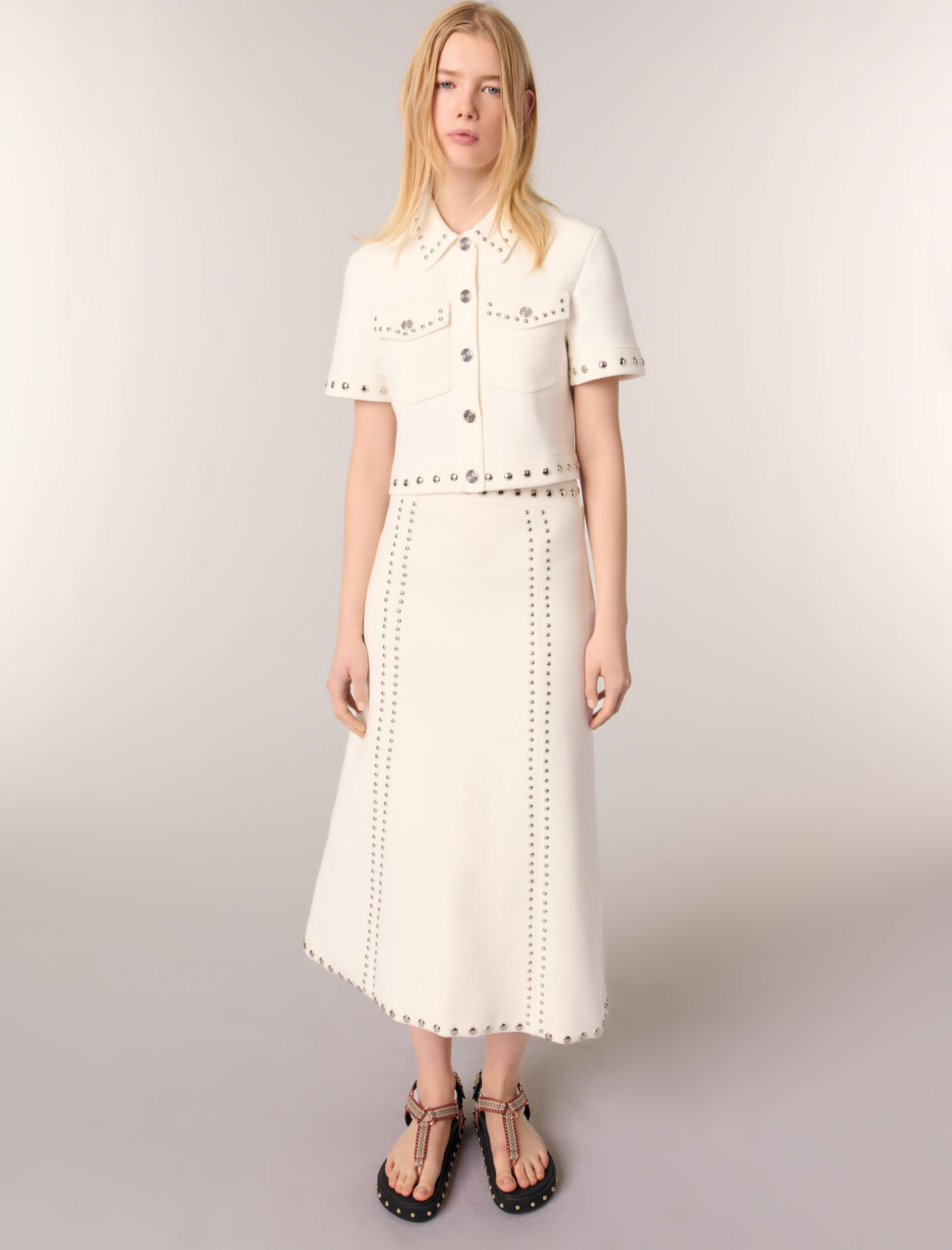 Женская юбка миди с заклепкамиЖенская юбка миди с заклепкамиЖенская юбка миди с заклепками