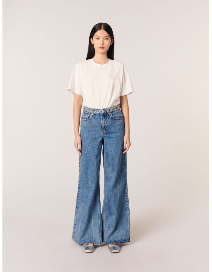 Жіночі джинси кльош з заклепками