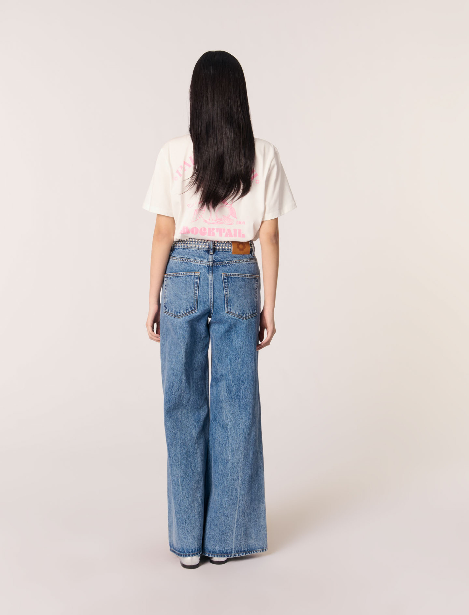 Жіночі джинси кльош з заклепками