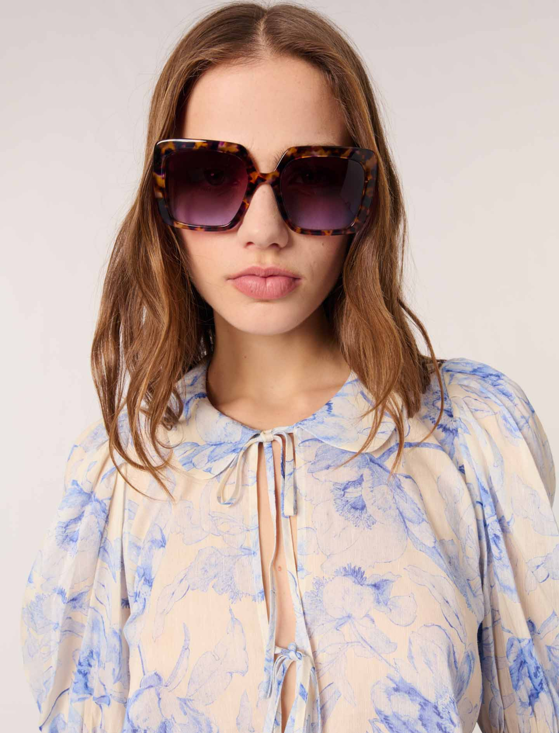 Жіноча блуза з квітковим принтом Жіноча блуза з квітковим принтом