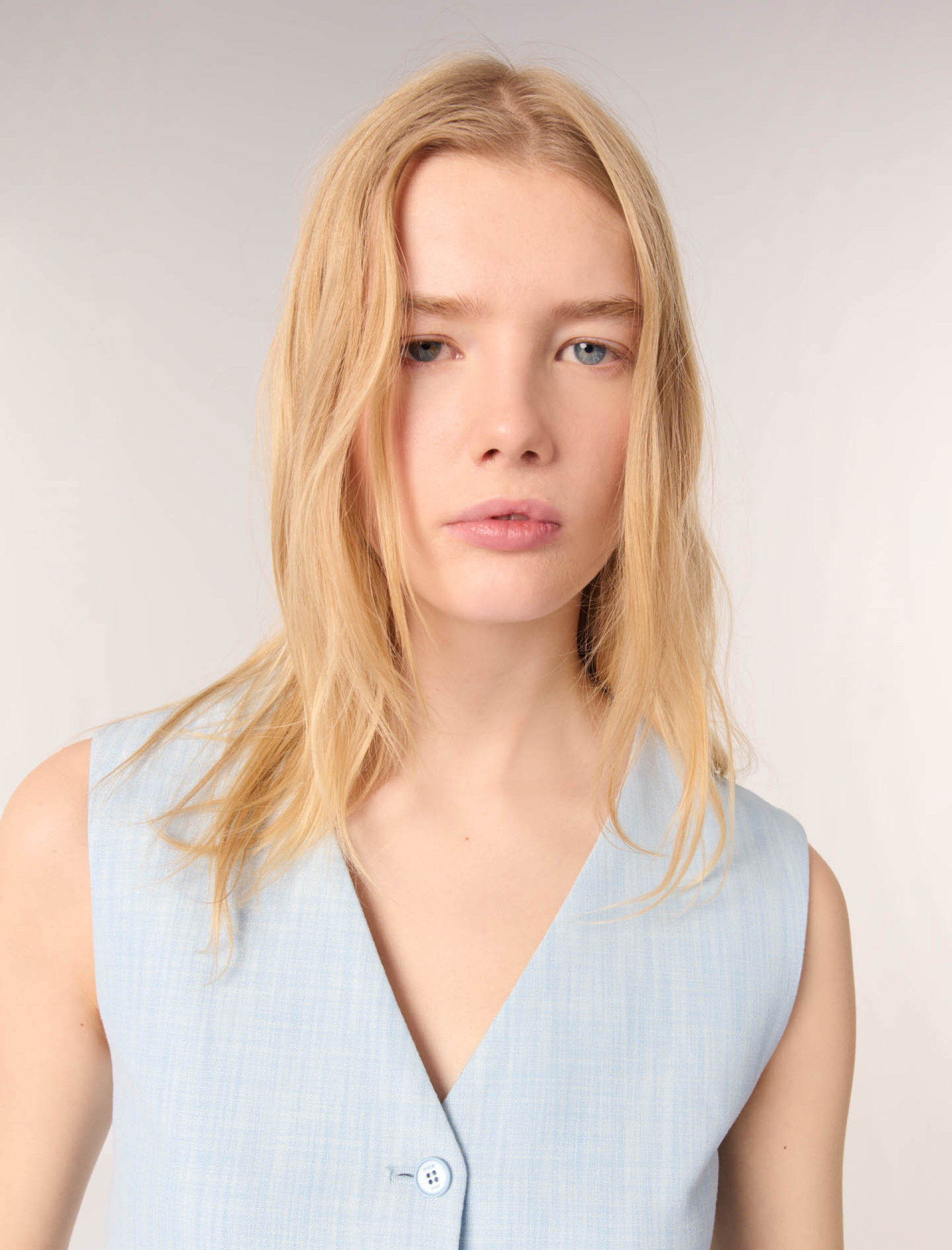 Женский костюмный жилет