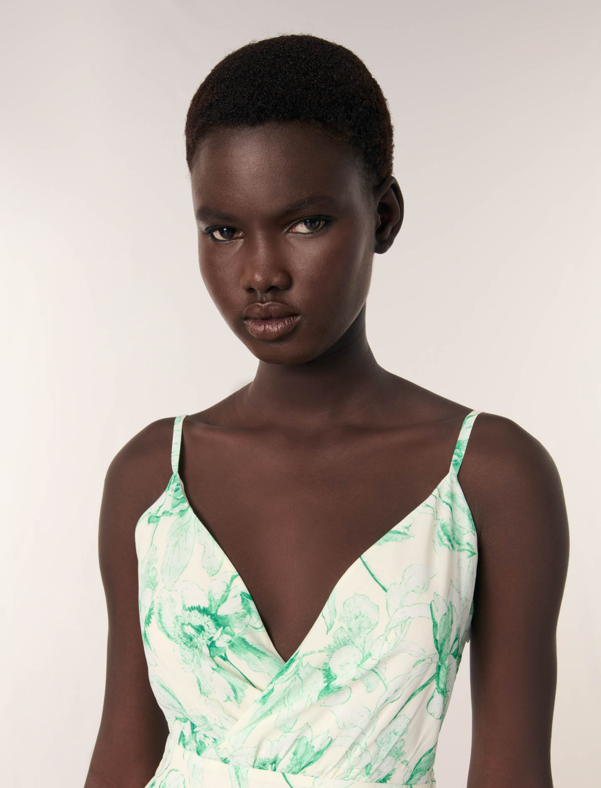 Жіноча сукня з принтом та оборками Жіноча сукня з принтом та оборками