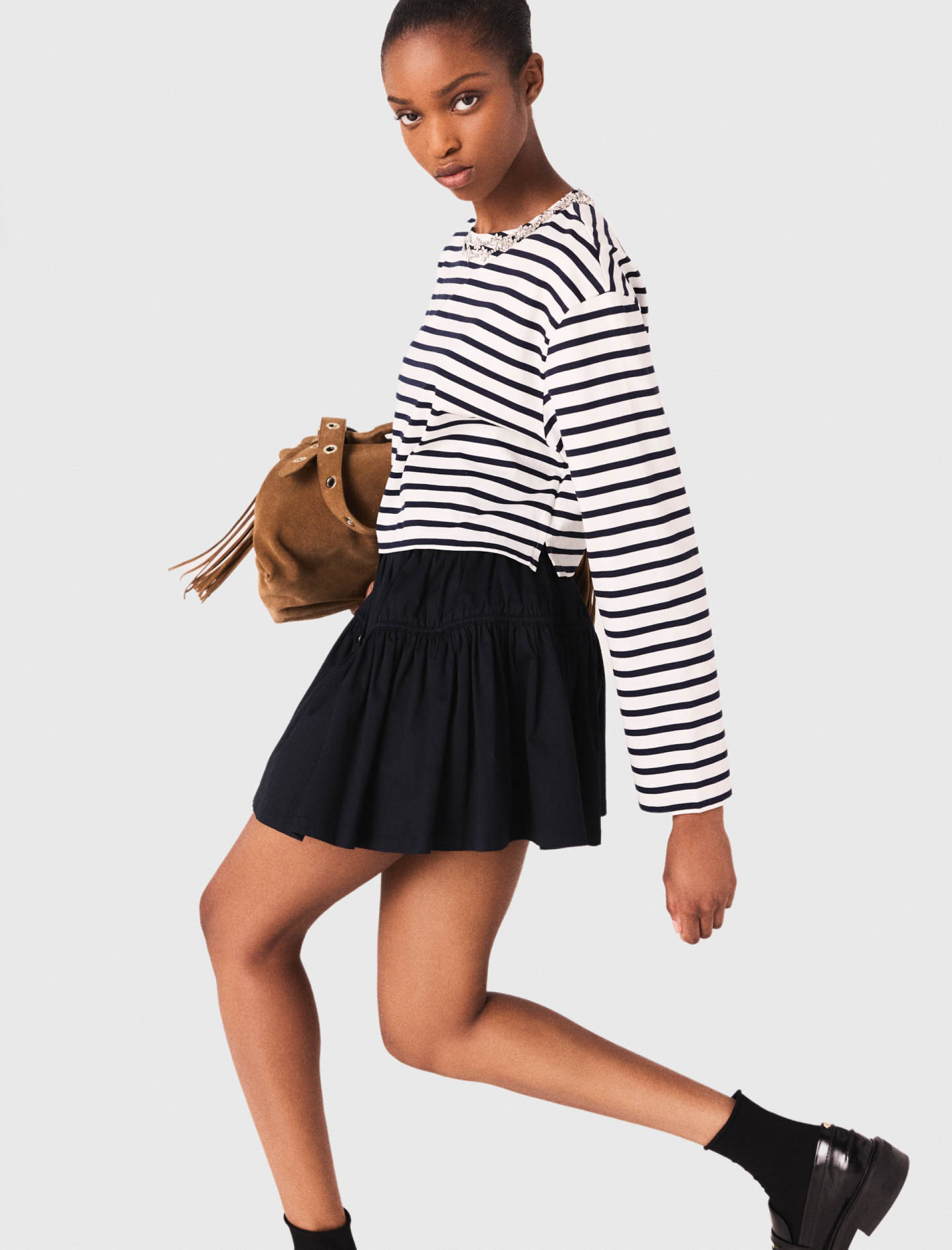 Жіноча смугаста футболка з довгими рукавами