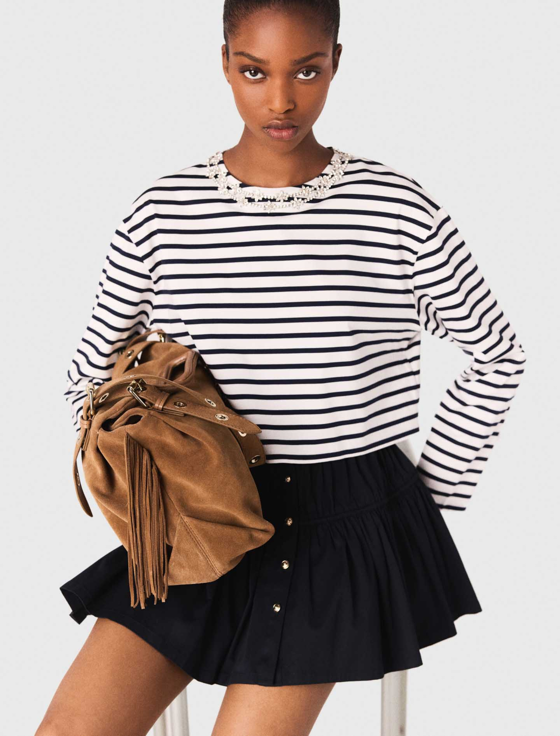 Жіноча смугаста футболка з довгими рукавами