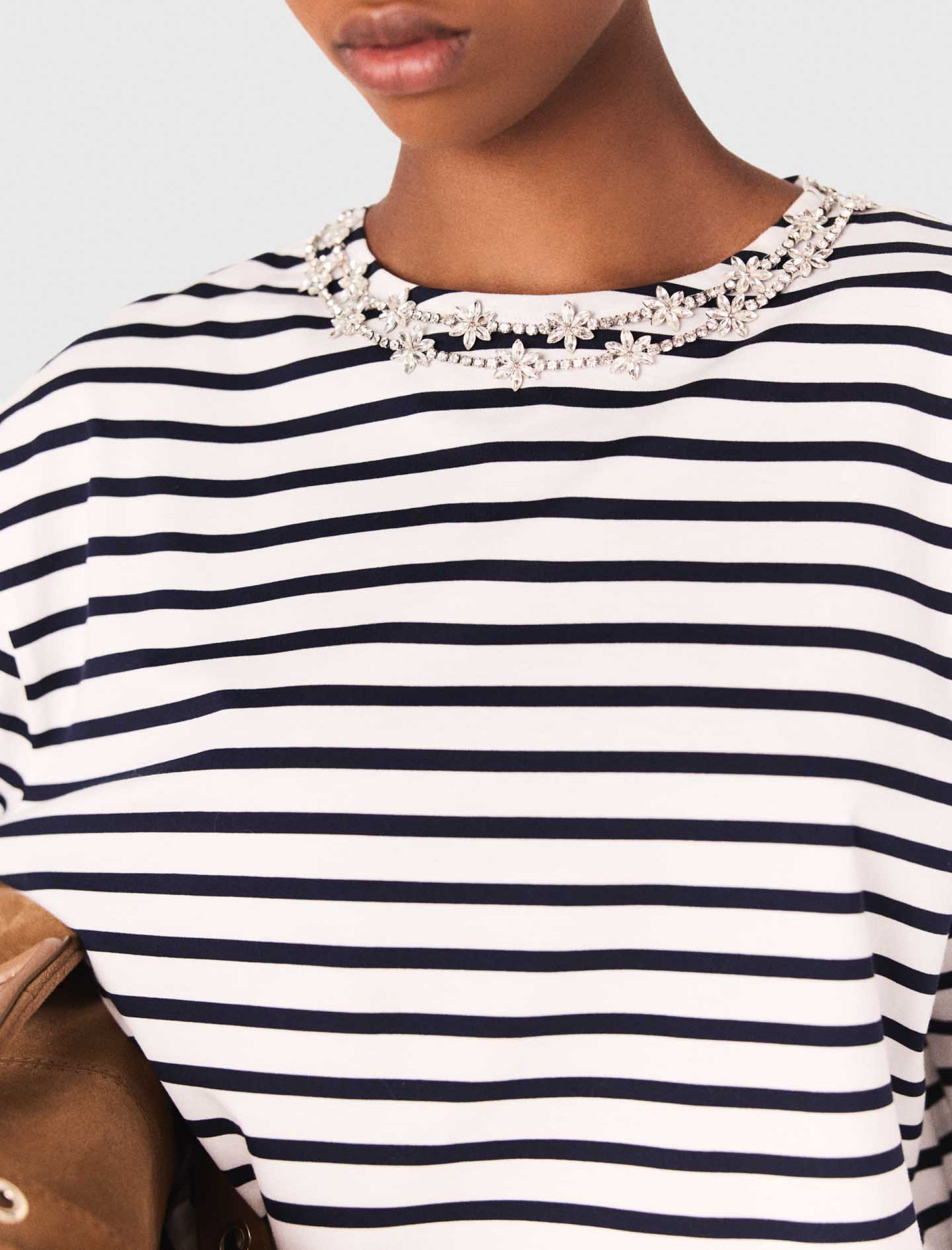 Жіноча смугаста футболка з довгими рукавами