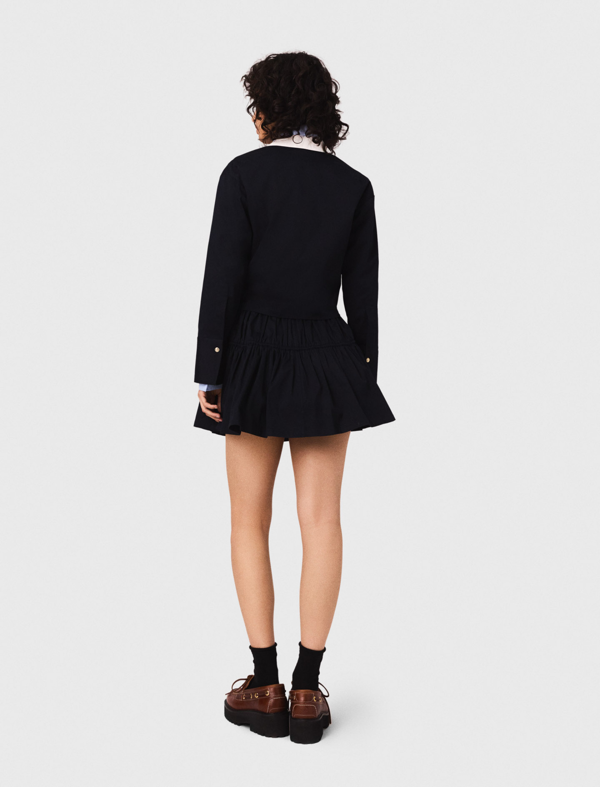 Женская короткая юбка в складку с эластичной талией Женская короткая юбка в складку с эластичной талией