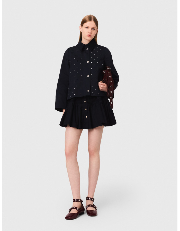 Жіноча куртка з оксамитовим коміром та заклепками