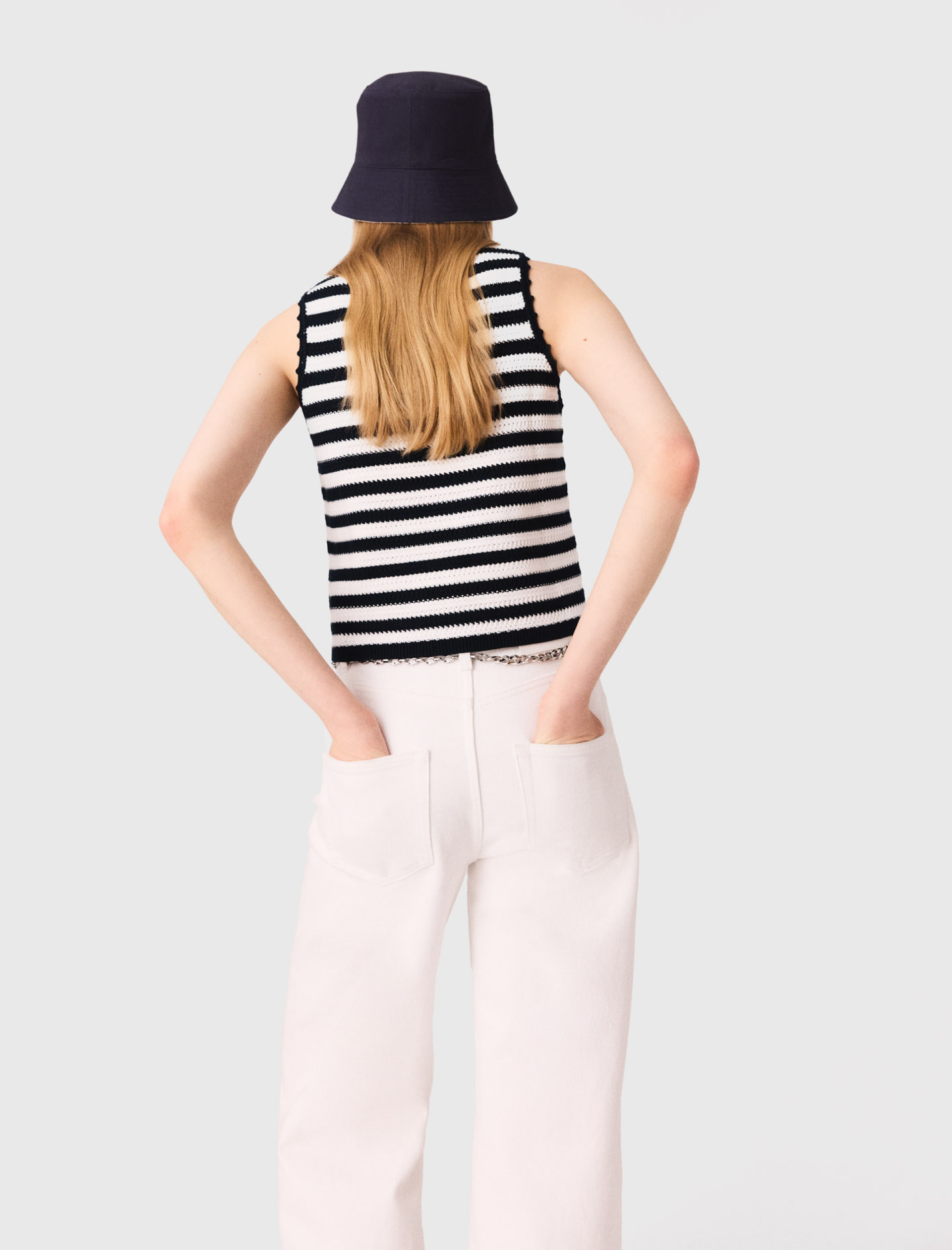 Жіночий в'язаний топ у смужку