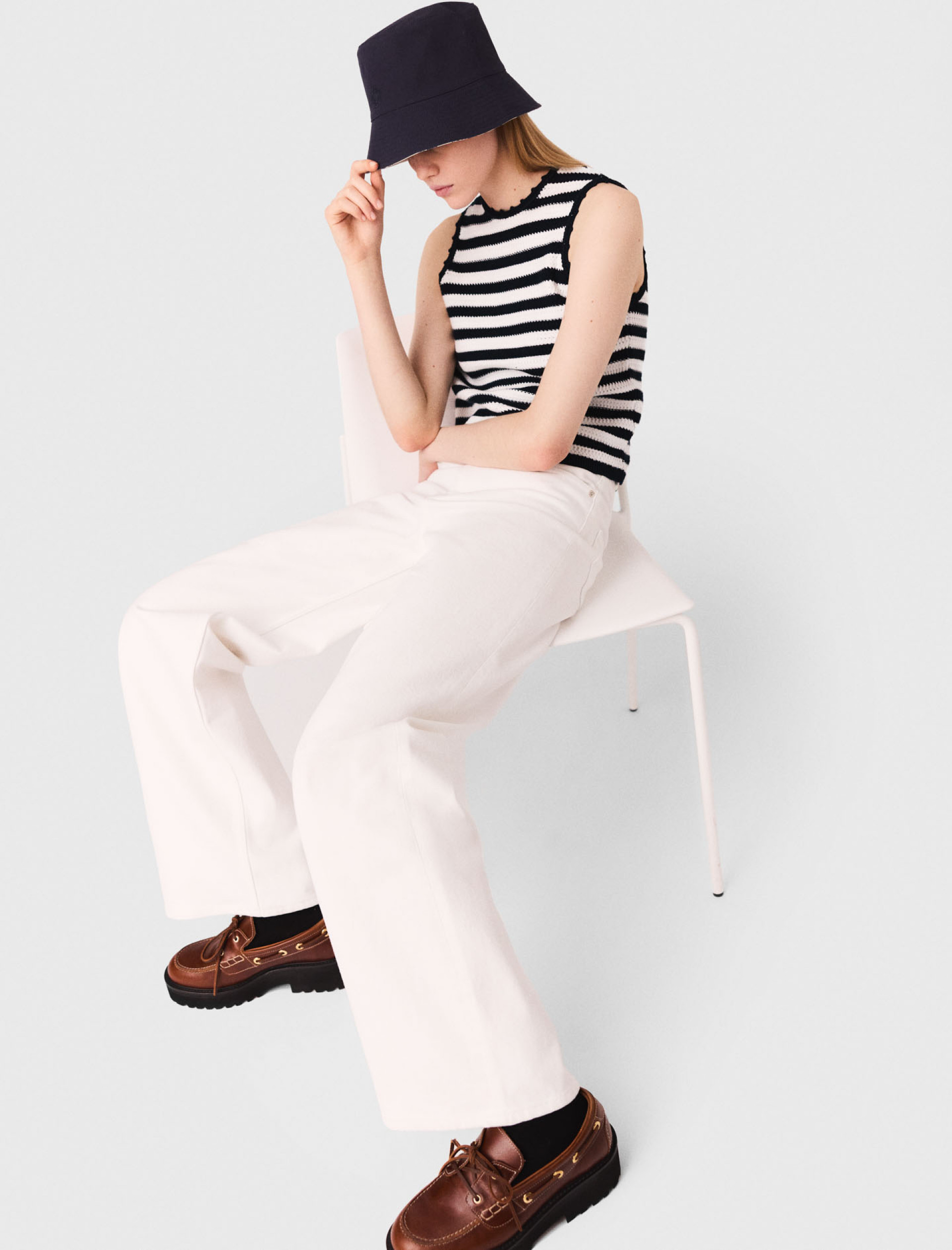 Жіночий в'язаний топ у смужку