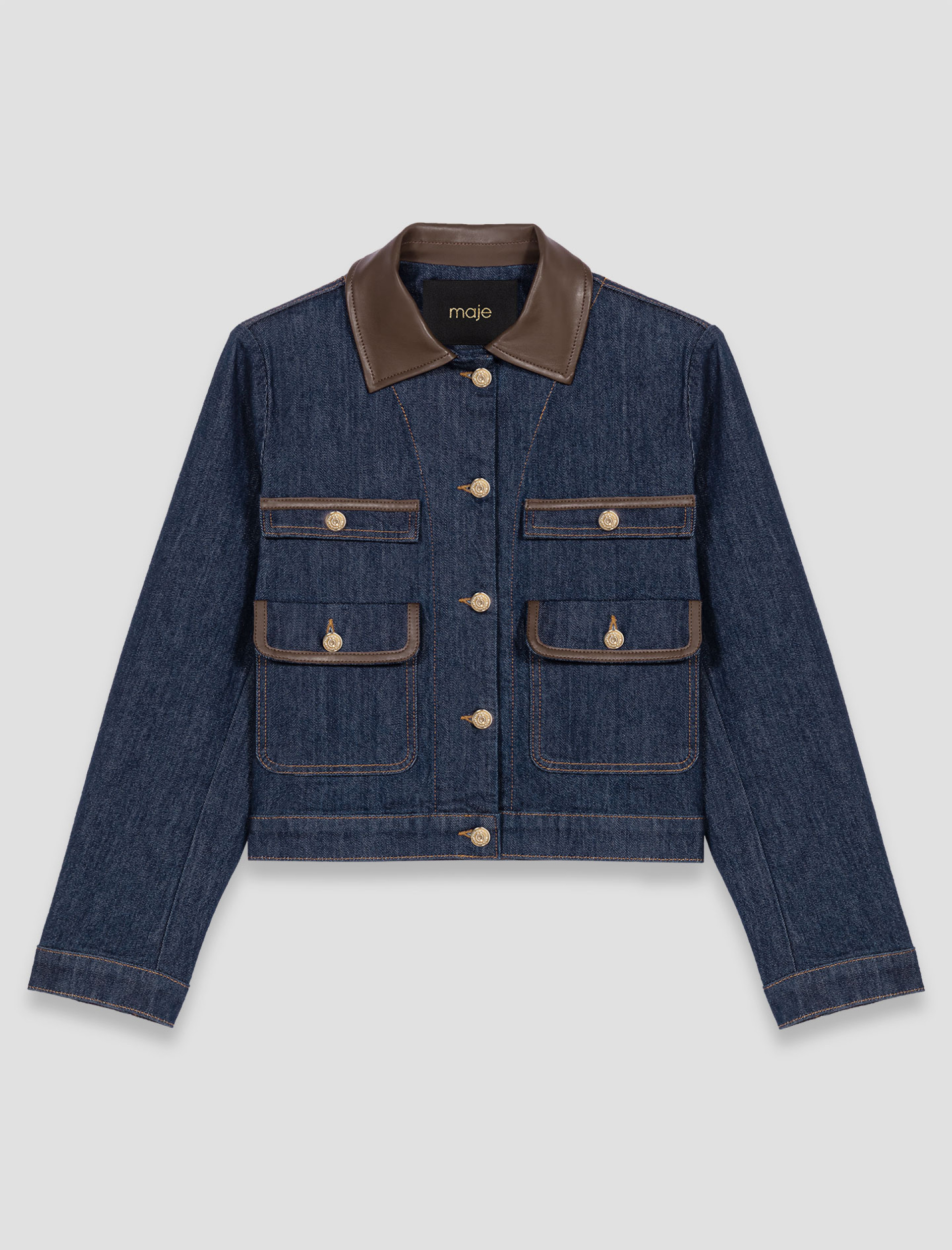 Жіноча джинсова куртка з контрастним коміром