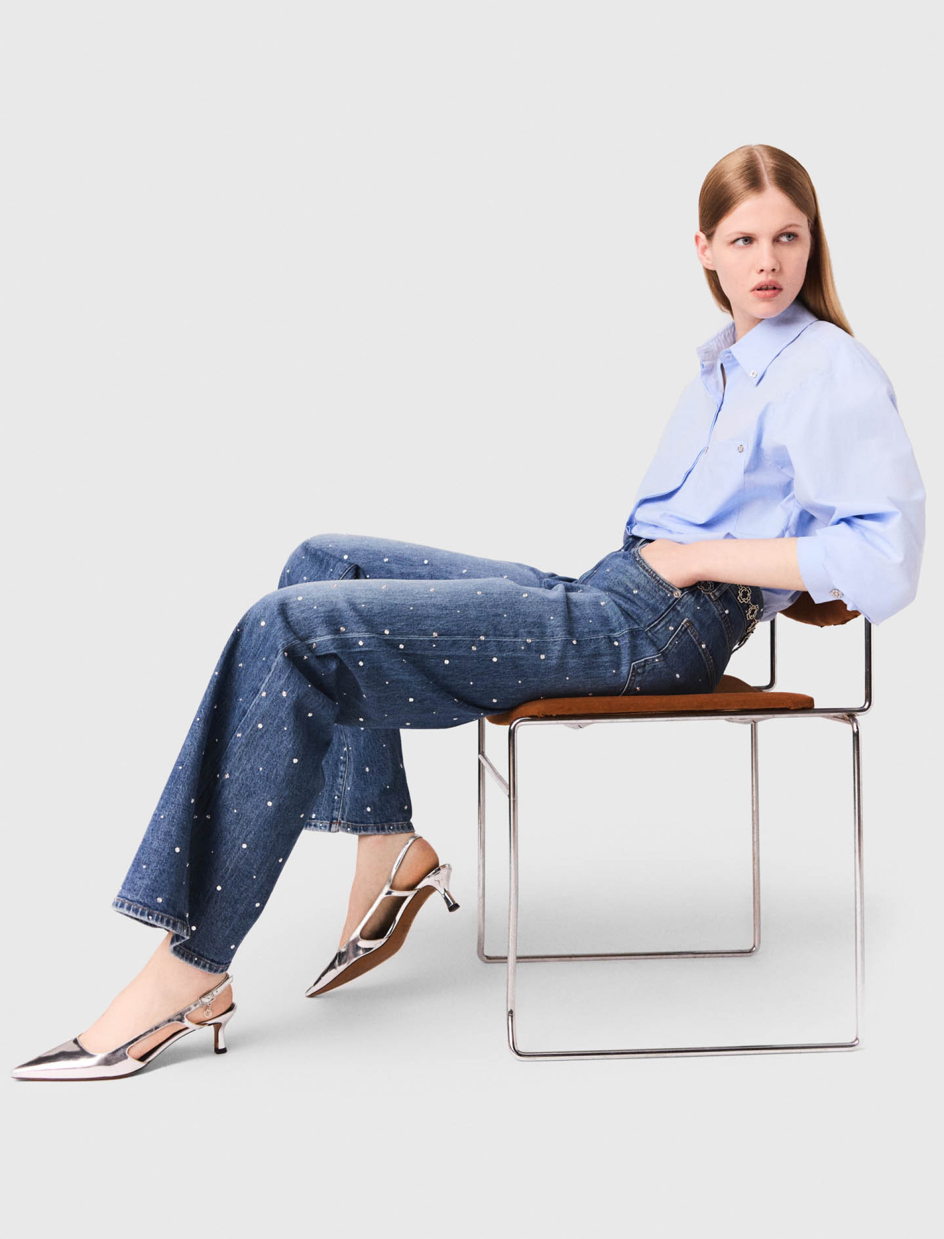 Жіночі широкі джинси з заклепками